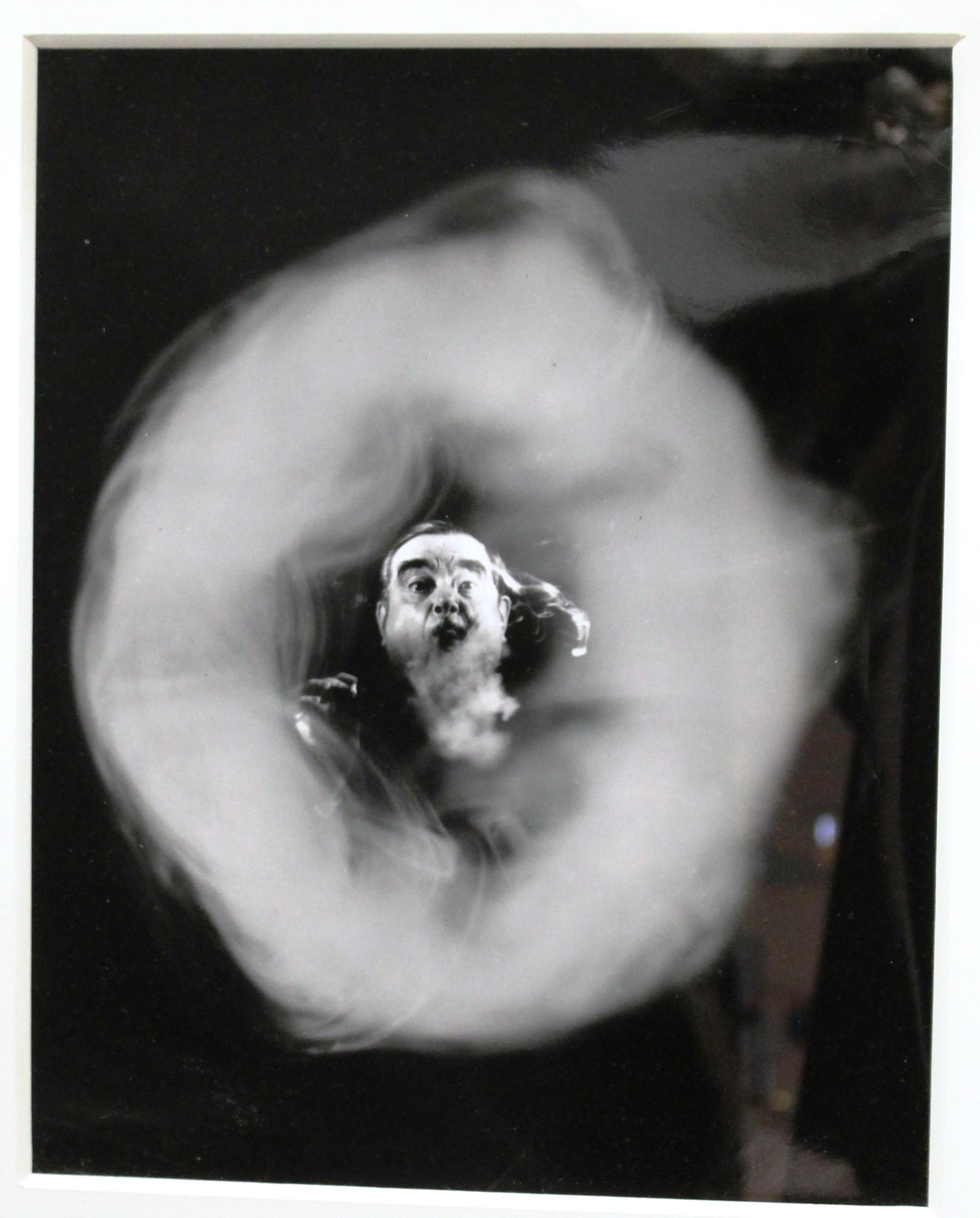 Framed 'Smoke Ring Blower' silver gelatin print photo series from LIFE Magazine, photographed by American photojournalist Howard Sochurek in 1949. Each photo measures 14 in. x 11 in. in dimension. Two of the three photos (excluding the middle one)