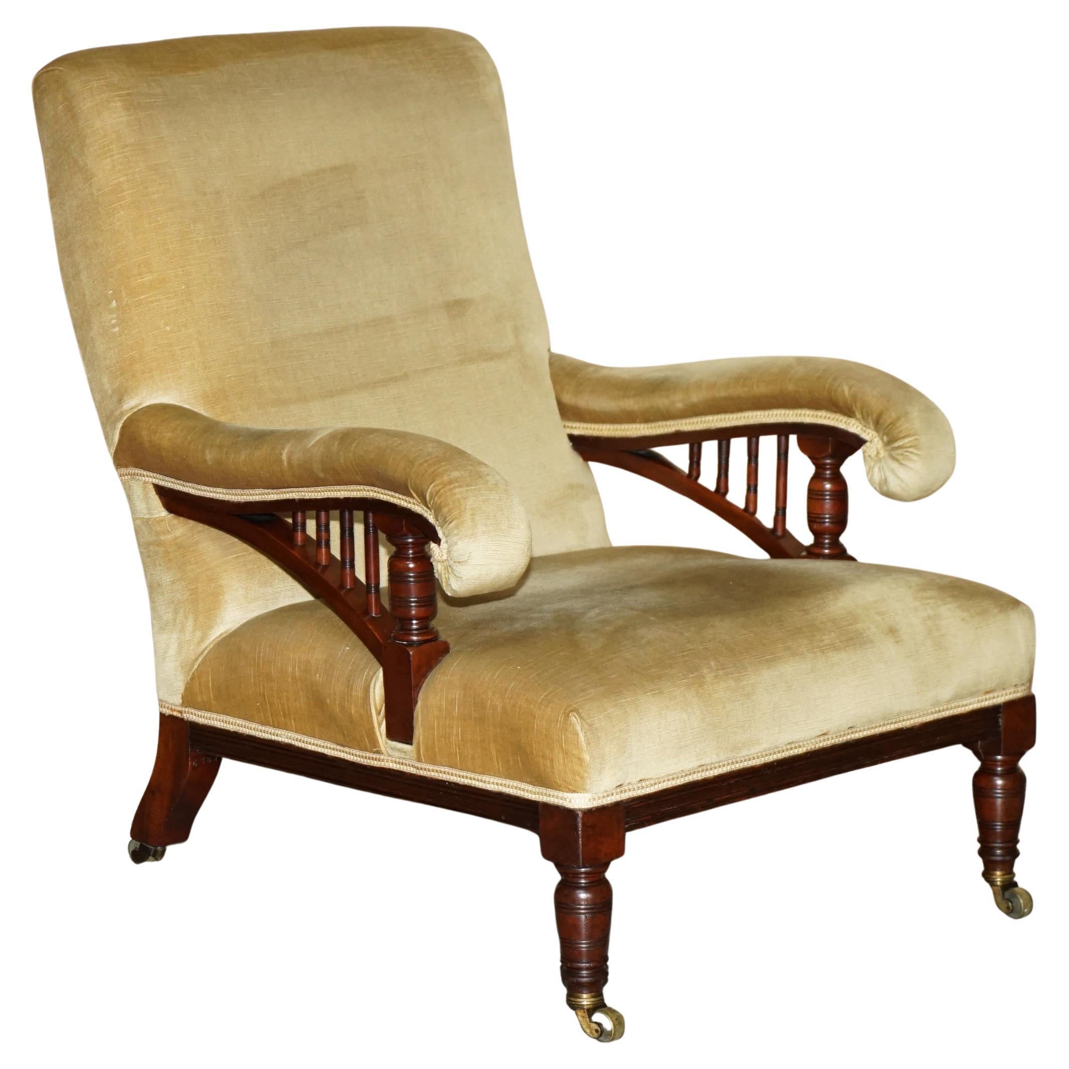 HOWARD & SON'S ATTRIBUTED ANTiQUE VICTORIAN OPEN LIBRARY ARMCHAIR STAMPED LEGS For Sale