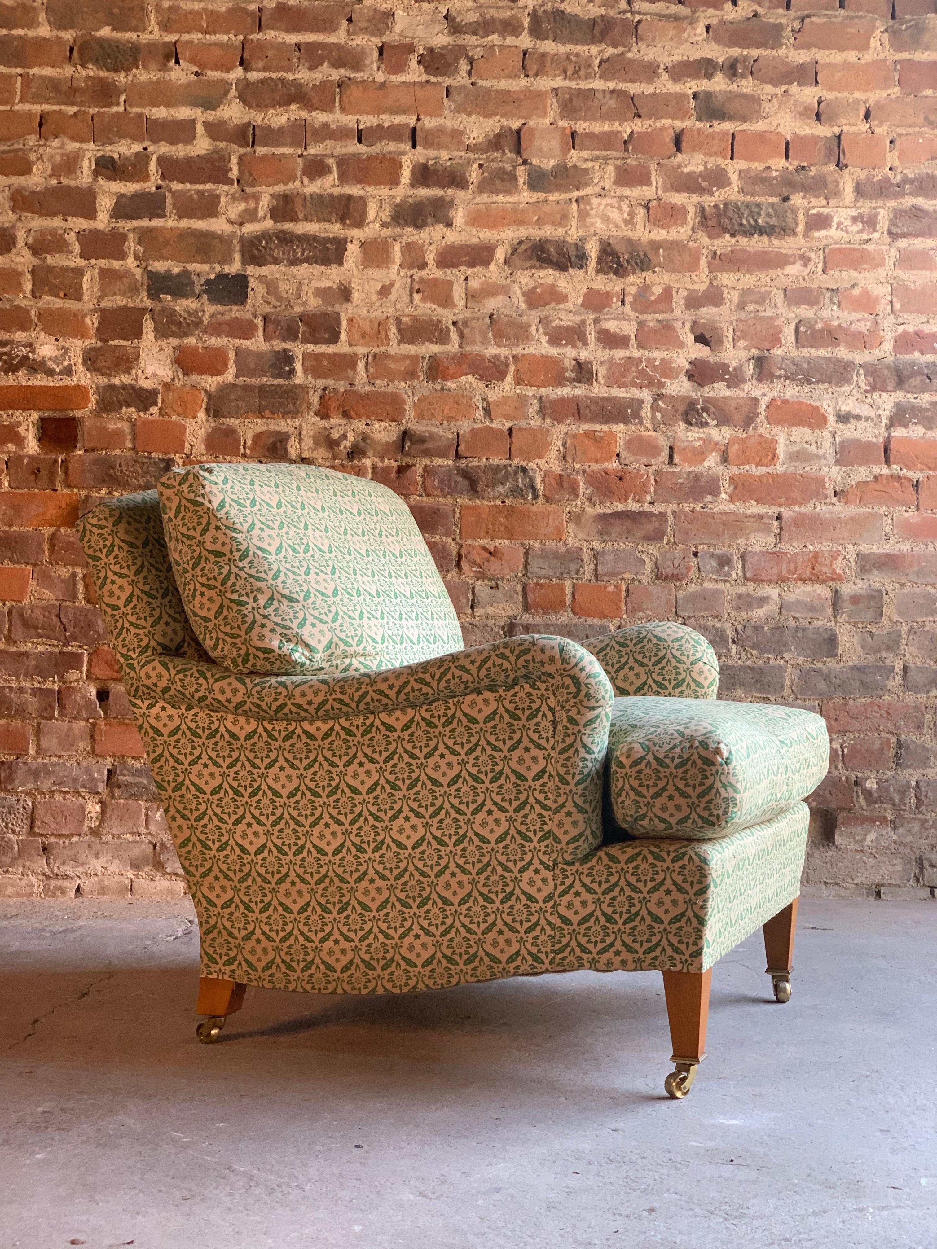 Howard & Sons Bridgewater armchair deep seated loose cushion chair, 2009.

Howard & Sons loose cushion back deep seated Bridgewater chair labelled to underside, H&S Serial Number 7507, with H& S lining, raised on light medium beech stained legs,