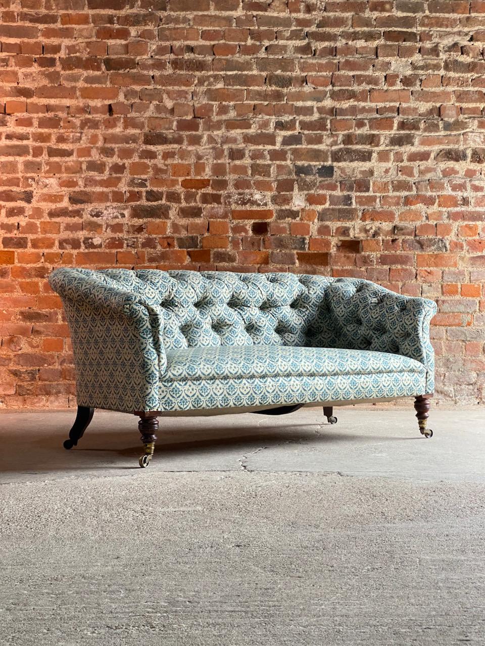 Howard & Sons chesterfield sofa 19th century circa 1850 no: 2

Magnificent early 19th century Howard & Sons chesterfield button back settee England circa 1850, superb petit and elegant country house sofa, the tufted seat back with bolstered seat