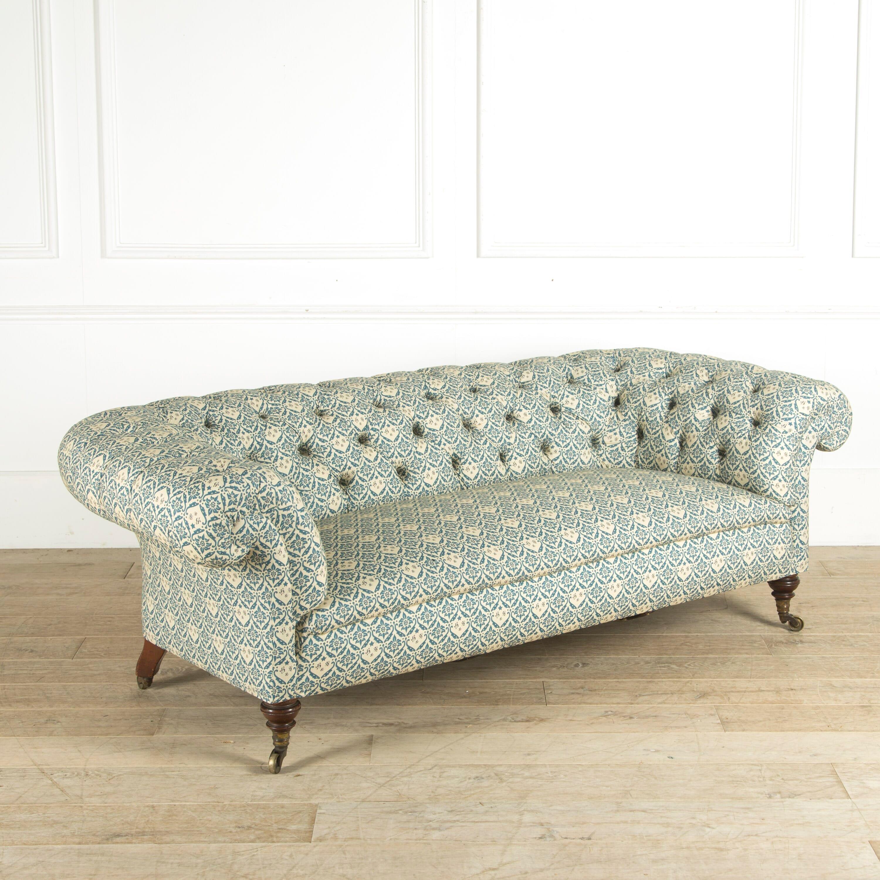 Totally refurbished Howard & Sons sofa, in the timeless Chesterfield style.

The sofa has been completely reupholstered in the traditional manner and with the materials used by the original company. It is covered with the iconic Howard-style