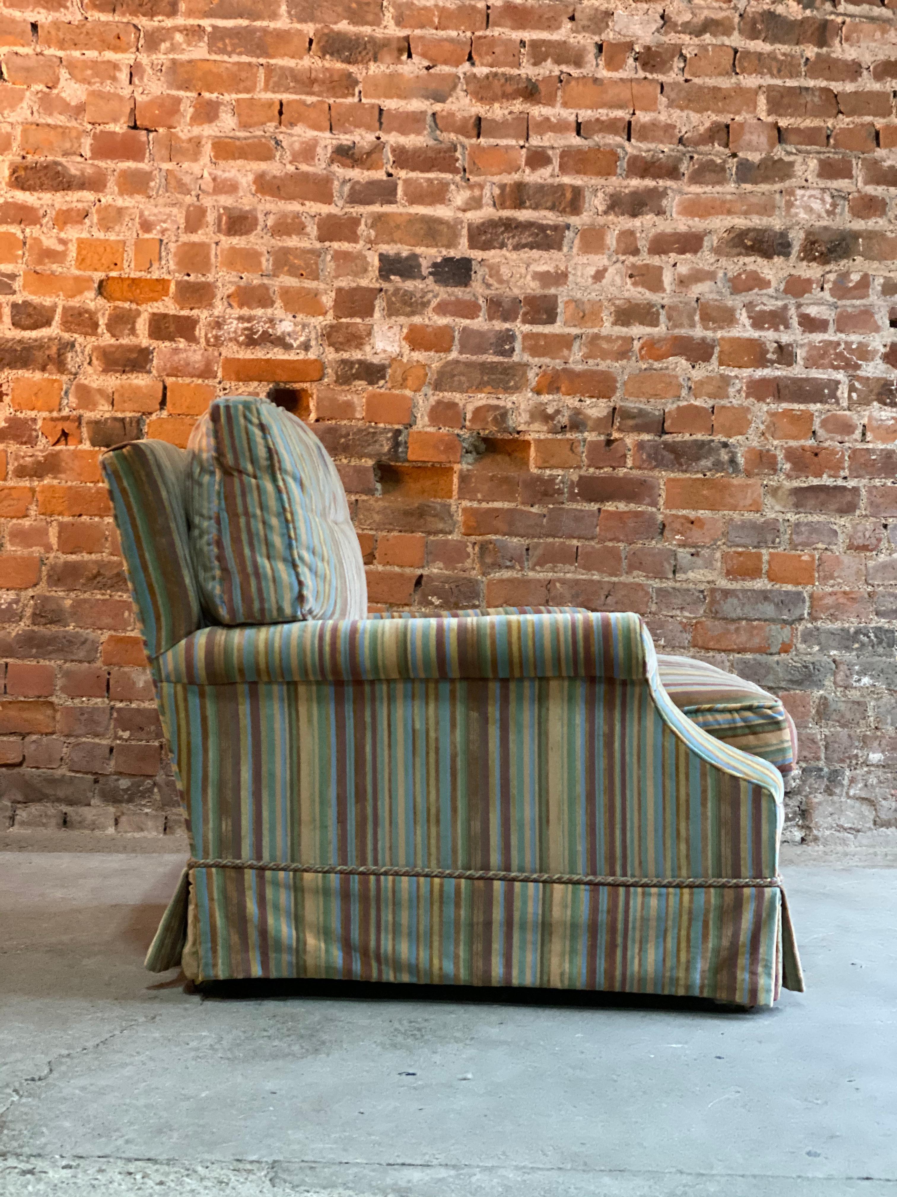 Howard & Sons Clayton armchair deep seated Rod Stewart Number 5

Sir Rod Stewart’s Essex home Howard & Sons loose cushion deep seated Clayton armchair , the armchair upholstered in a sumptuous striped velour upholstery, raised on medium beech