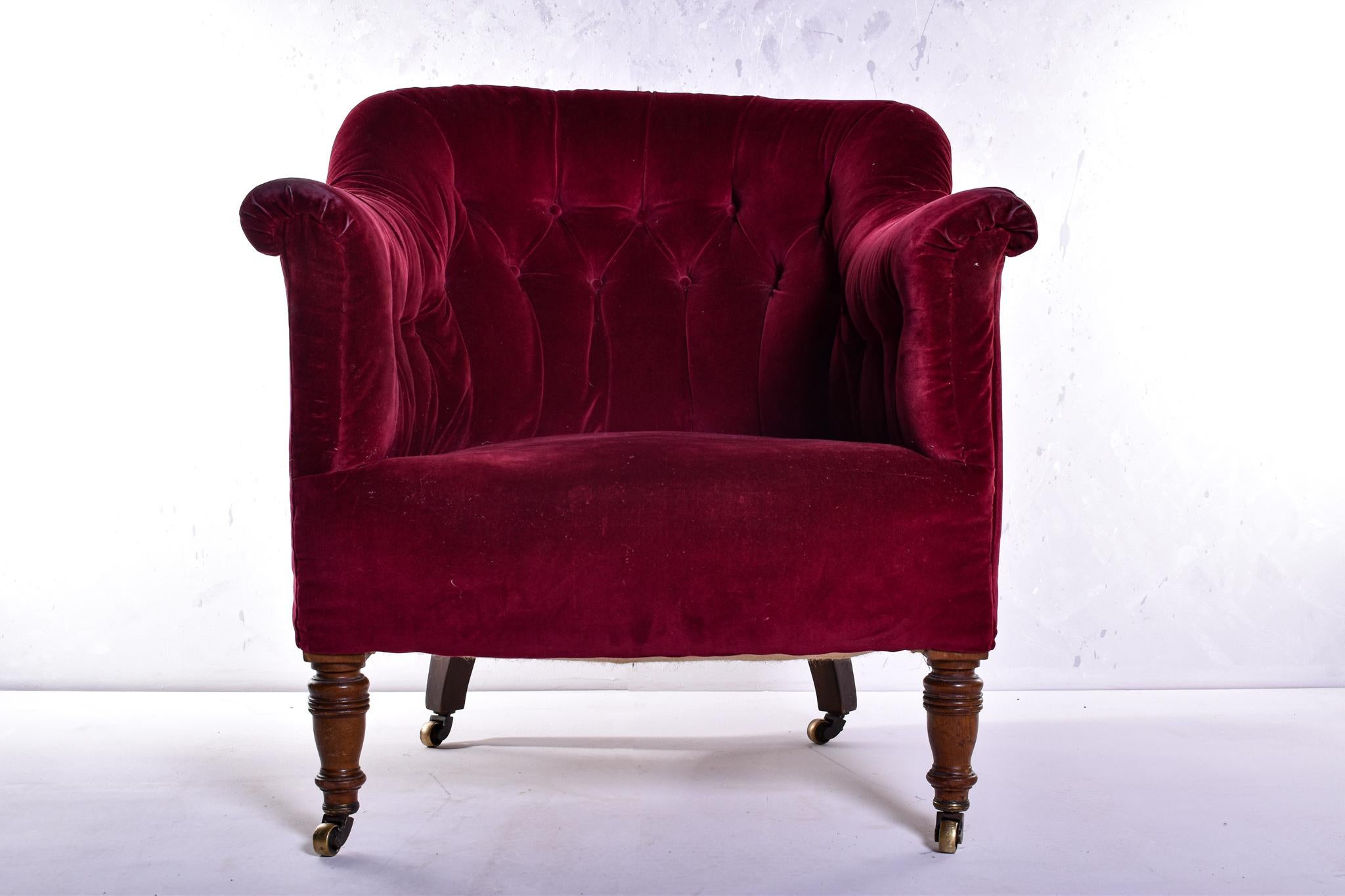 A true country house beauty with fantastic provenance, this classy tub chair from the master makers Howard & Sons was purchased from the Knighton Collection, Rutland House, Bakewell. Sitting proud on the signature turned front legs, terminating with