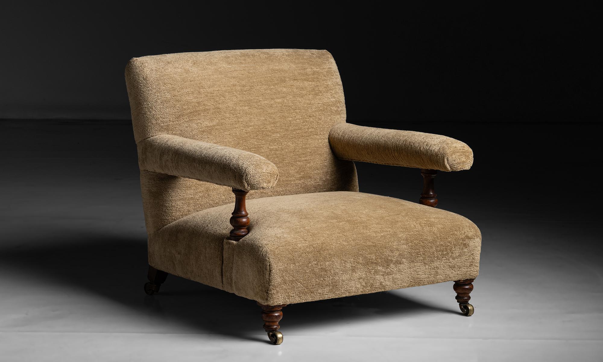 Howard & Sons Open Armchair in Chenille by Pierre Frey

England circa 1850

Low profile, Newly reupholstered.

Measures 28