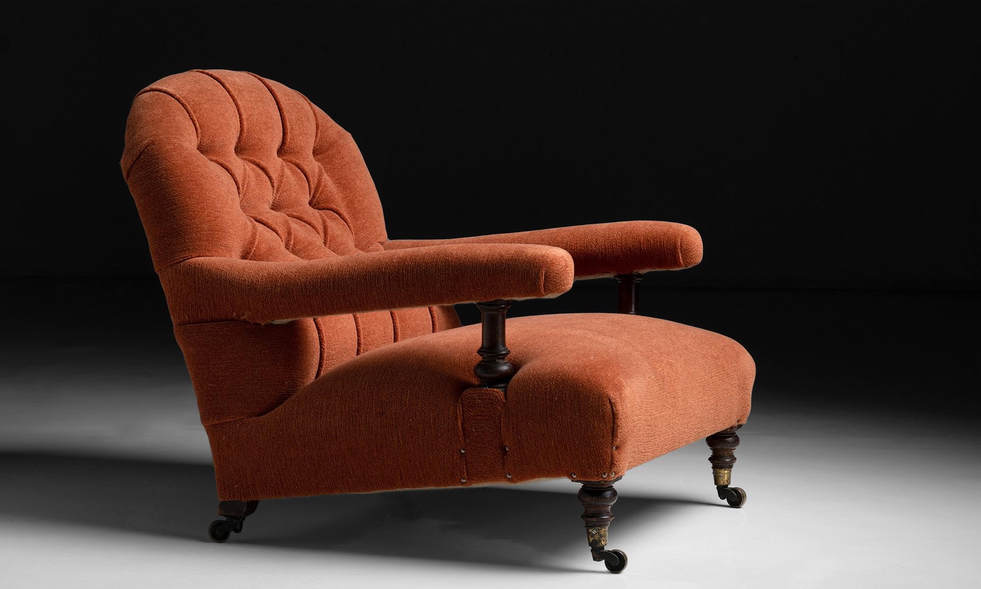 Howard & Sons open armchair in orange wool chenille.

England, circa 1890

Newly upholstered in wool chenille by Holland & Sherry on antique frame.

Measures: 30” Wx 37” D x 30” H x 15” seat.