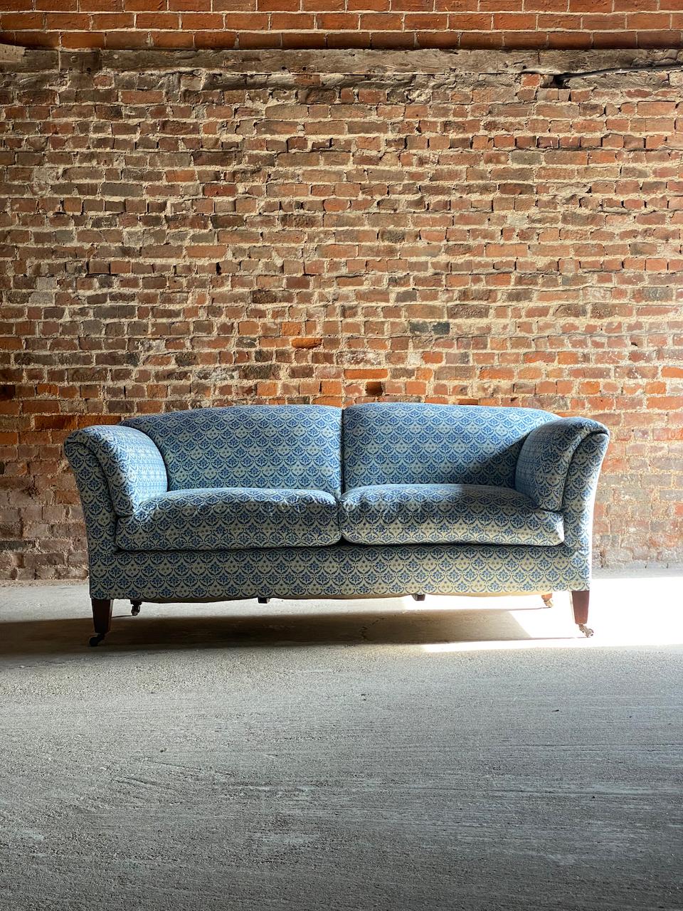Howard & Sons portarlington sofa, Circa 1850.

Magnificent 19th century Howard & Sons ‘English Country House’ Portarlington Sofa circa 1850, completely restored and re upholstered in the finest Howard & Sons Blue H&S monogrammed ticking material,