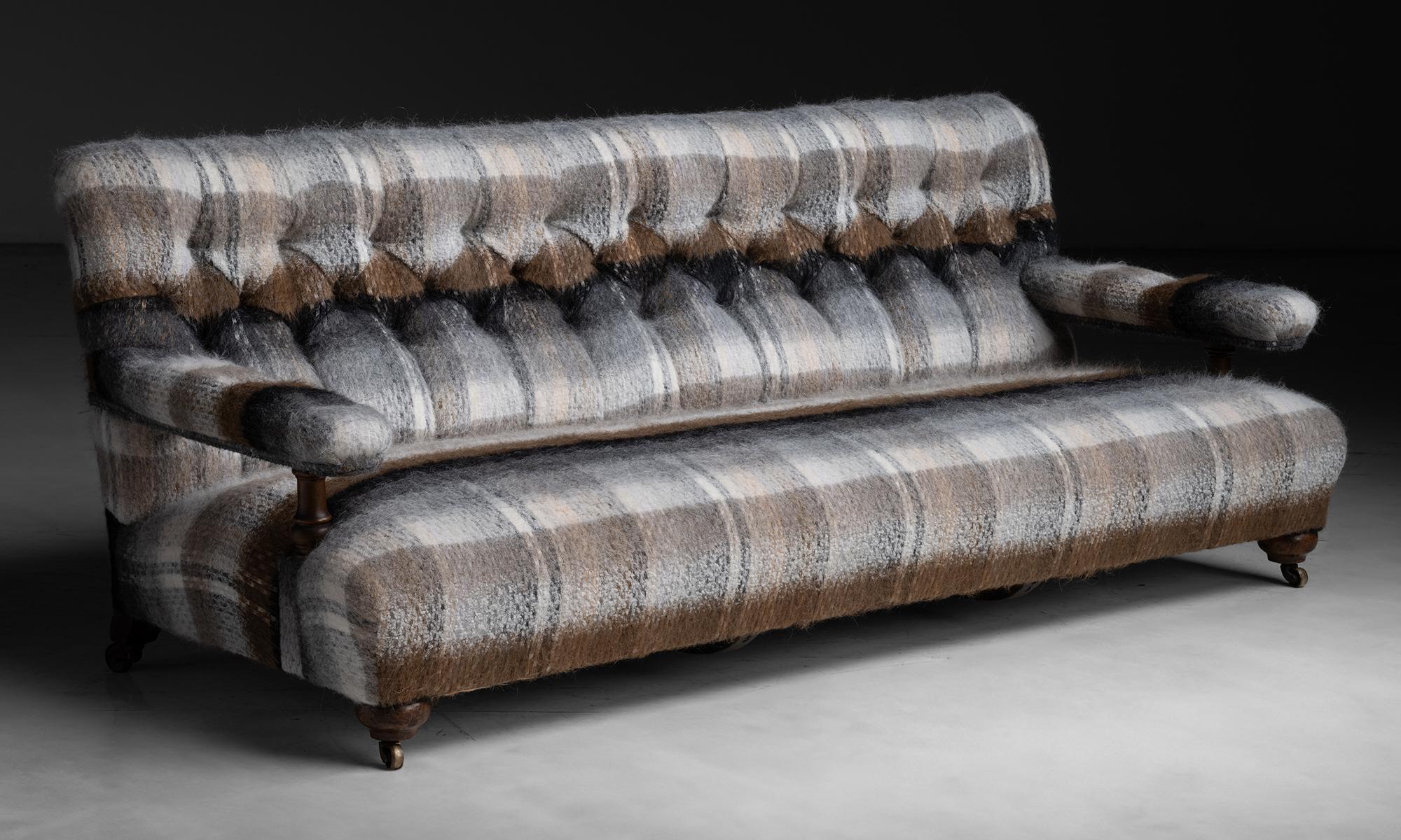 Howard & Sons Sofa in Pierre Frey Wool Plaid

England circa 1880

Open arm sofa, newly upholstered in Wool / Alpaca / Mohair blend by Pierre Frey.

75.5”L x 34”d x 29.5”h x 12”seat