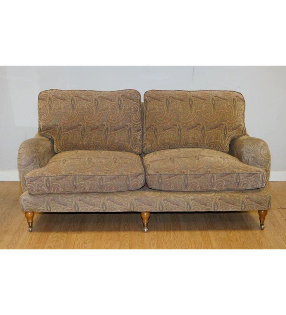 We are delighted to offer for sale this Stunning Rare Mulberry home designer sofa.

The colour over the years has faded slightly in some areas. However, this doesn't affect its use or its beauty.

The cushions are still as plump as they can be.