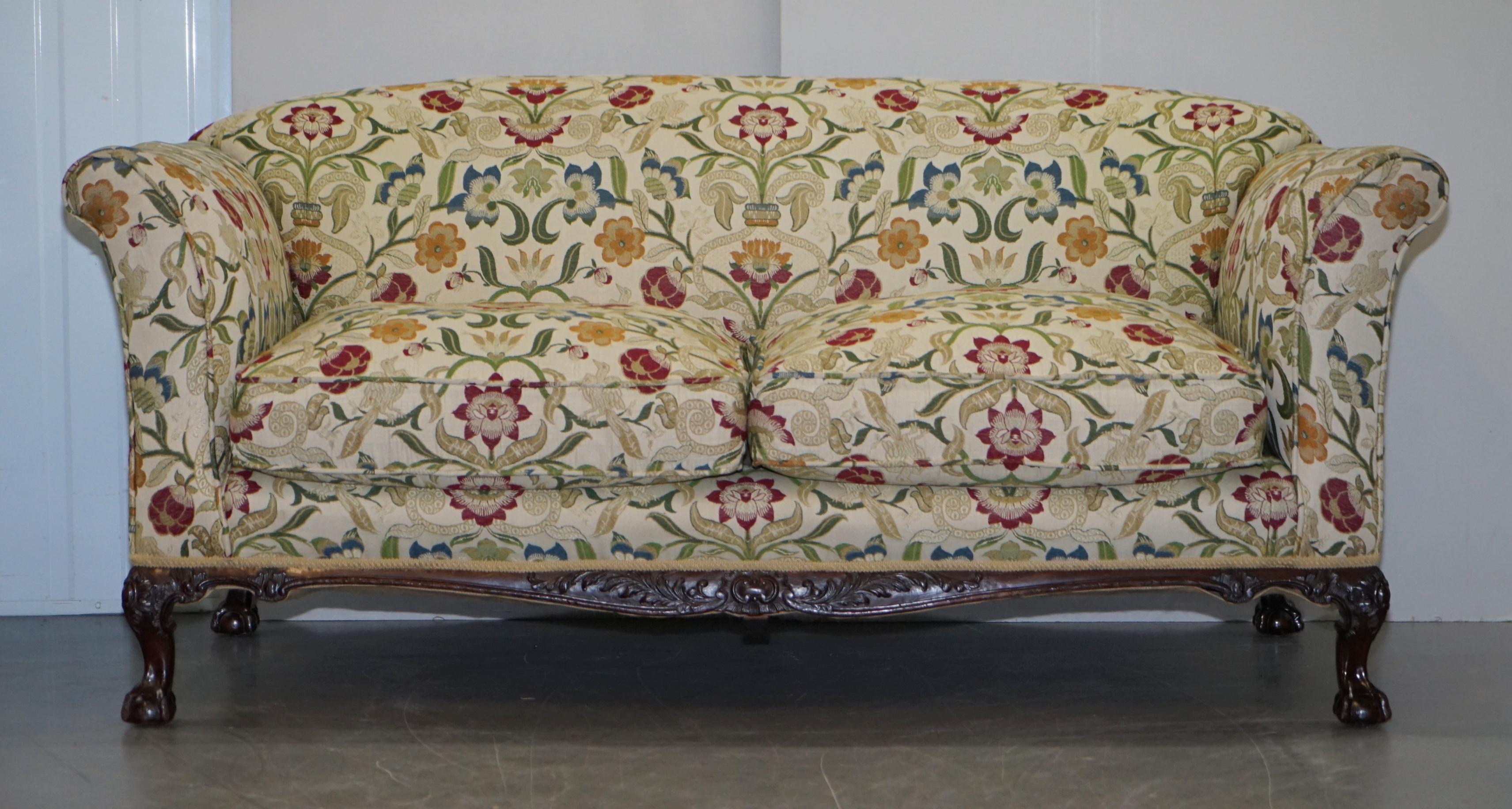 We are delighted to offer for sale this stunning exceptionally rare original Victorian walnut framed Claw & Ball feet Howard & Son’s Berners Street stamped sofa with the original feather filled cushions, horse hair filling and William Morris