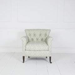 Fauteuil anglais antique de style Howard Woodstock