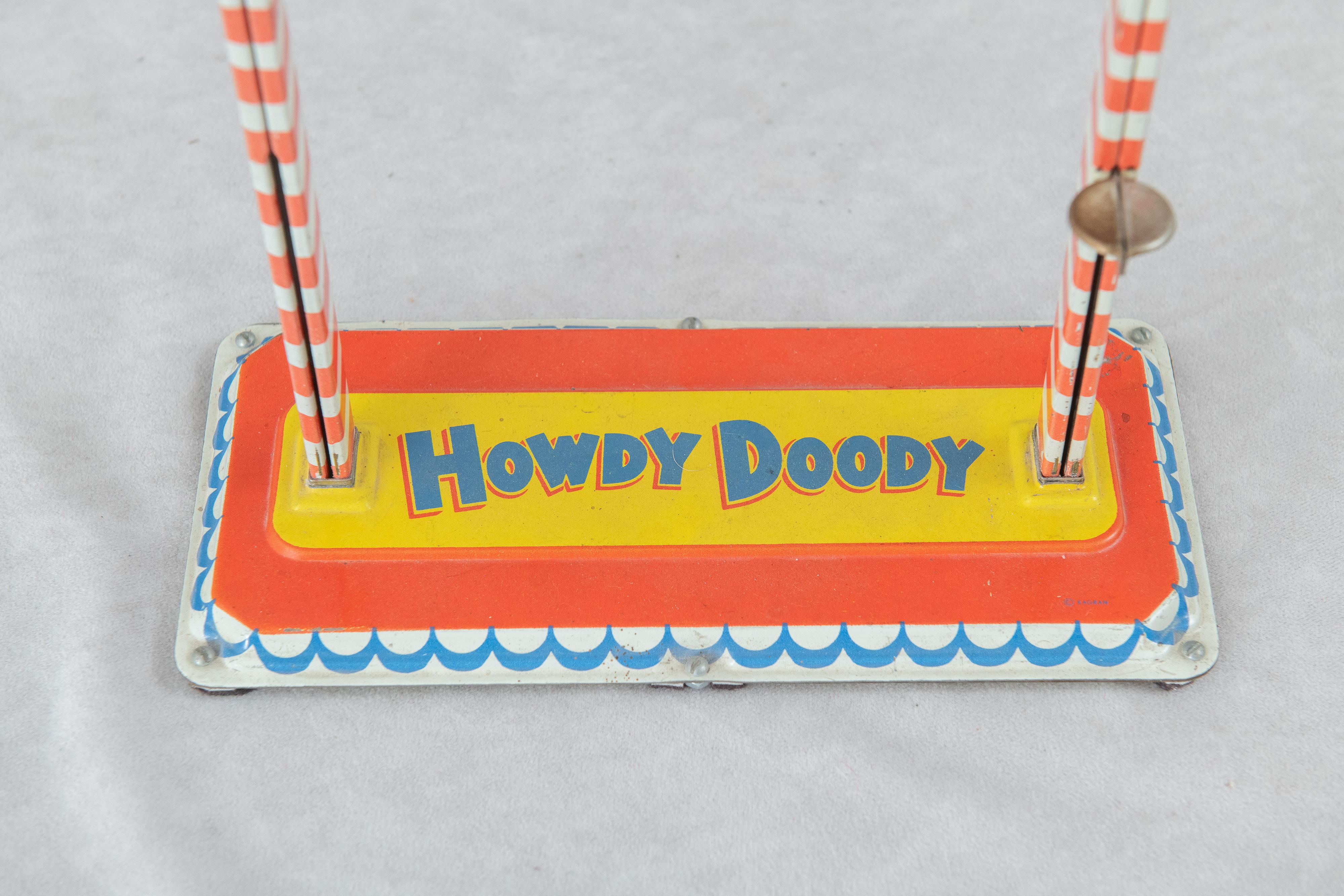 Smaltato Giocattolo acrobatico Howdy Doody, 1950 circa, celluloide e metallo, firmato dal produttore in vendita