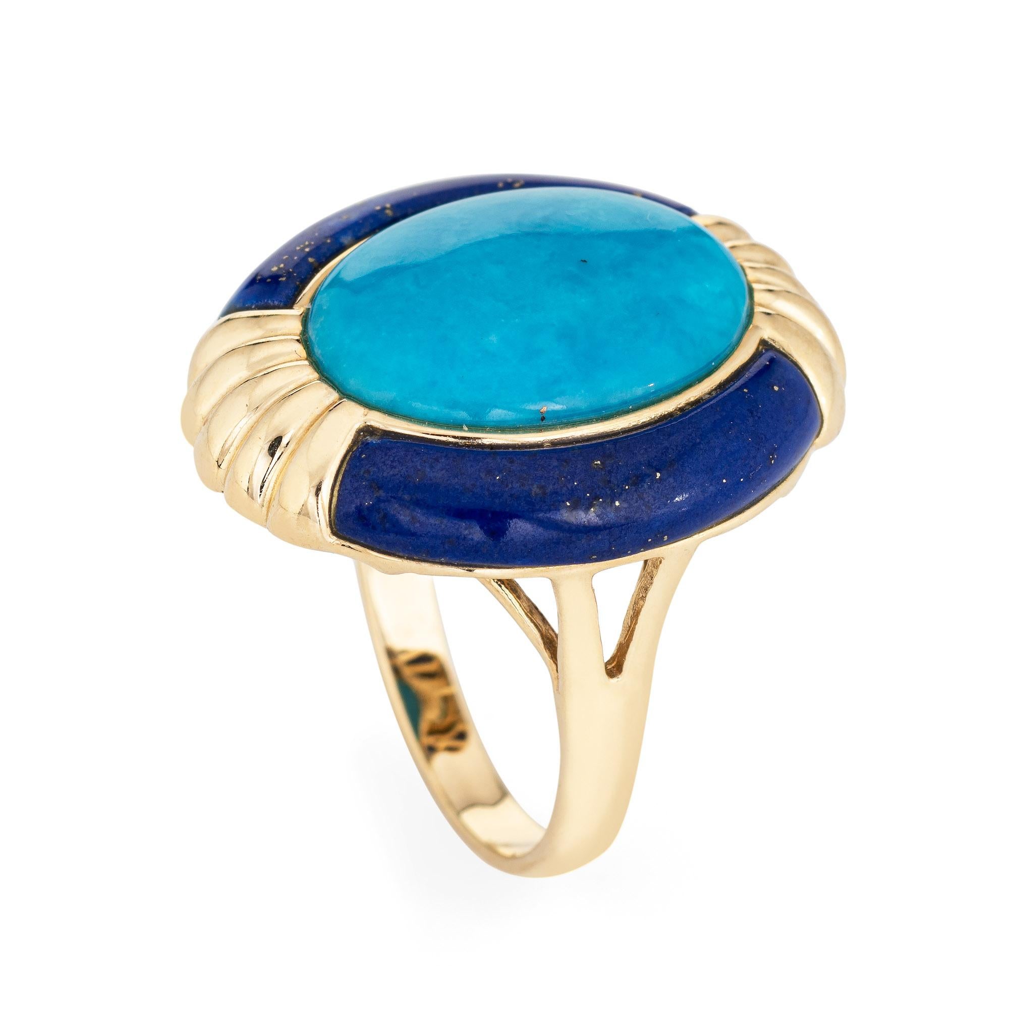 Stylish howlite & lapis lazuli cocktail ring crafted in 14 karat yellow gold. 

Cabochon cut howlite (dyed) measures 16mm x 12mm. Lapis lazuli measures 20mm x 4mm. The stones are in very good condition and free of cracks or chips.  

Blue howlite is