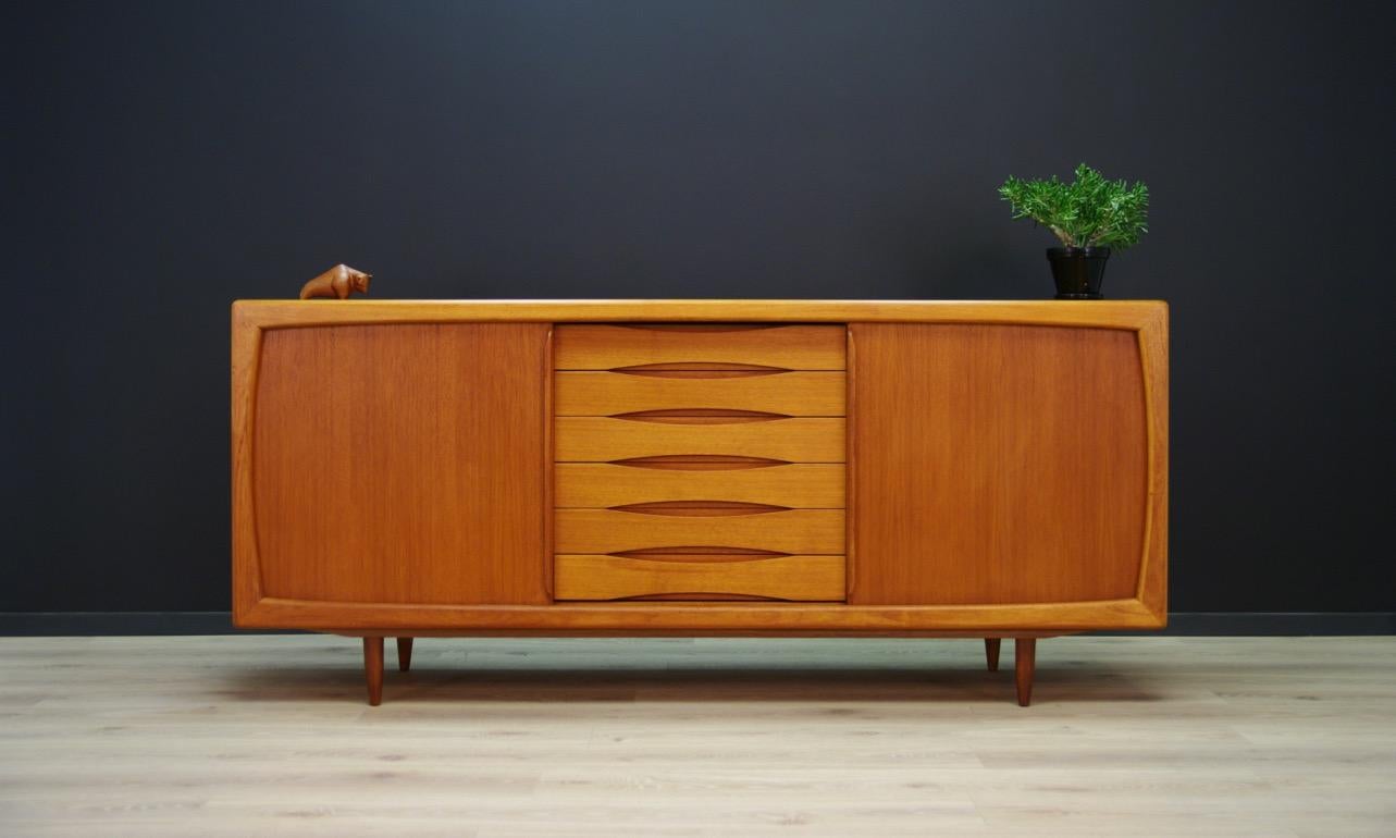 Original sideboard from the 1960s-1970s, Minimalist Danish design by H.P. Hansen. Furniture covered with teak veneer. Spacious interior behind sliding doors and six external drawers. Preserved in good condition (scratches and small bruises),