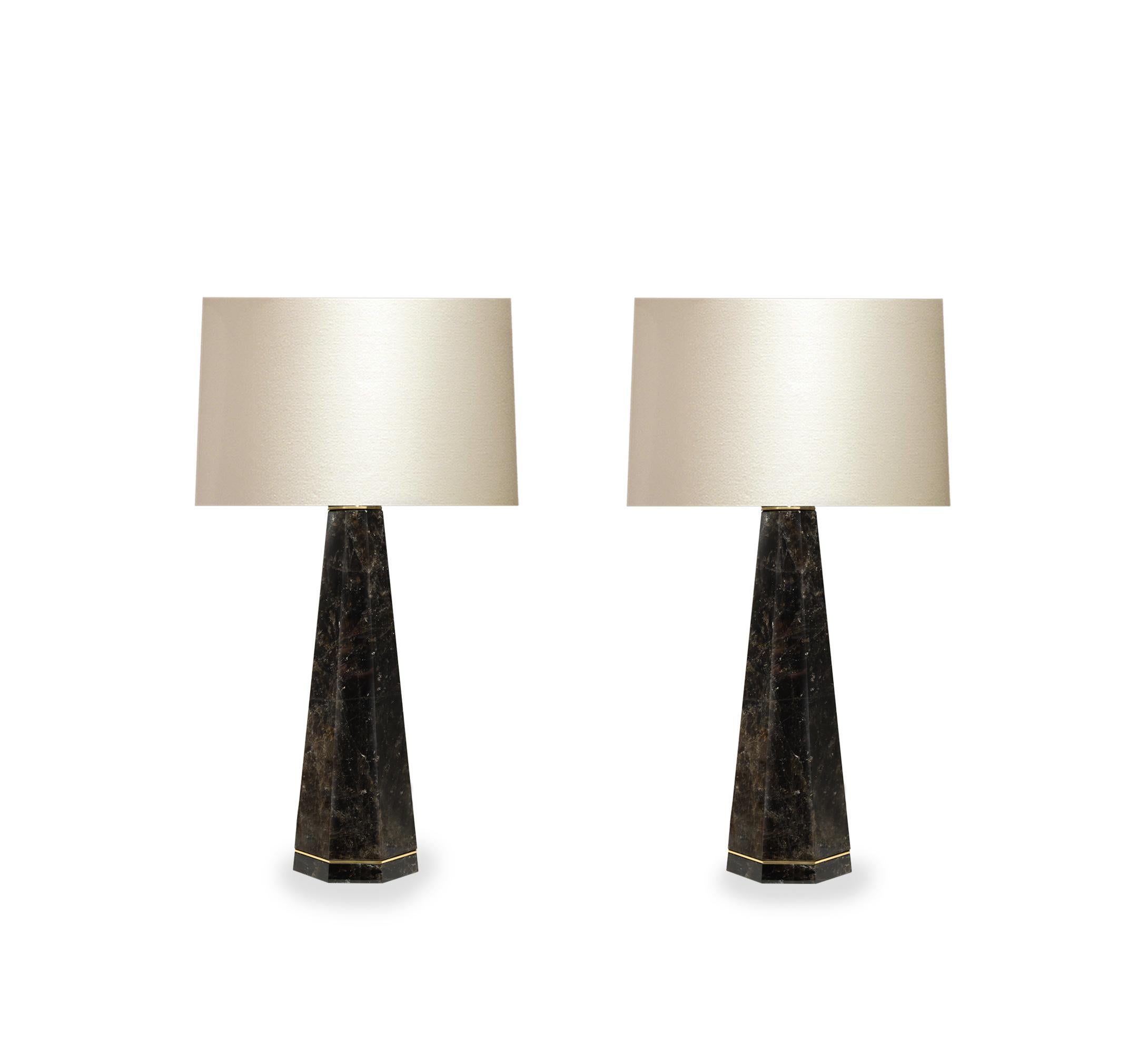 Pair of column smoky rock crystal quartz lamps with polished brass decoration. Created by Phoenix Gallery, NYC.
Measure: To the top of rock crystal 19.5