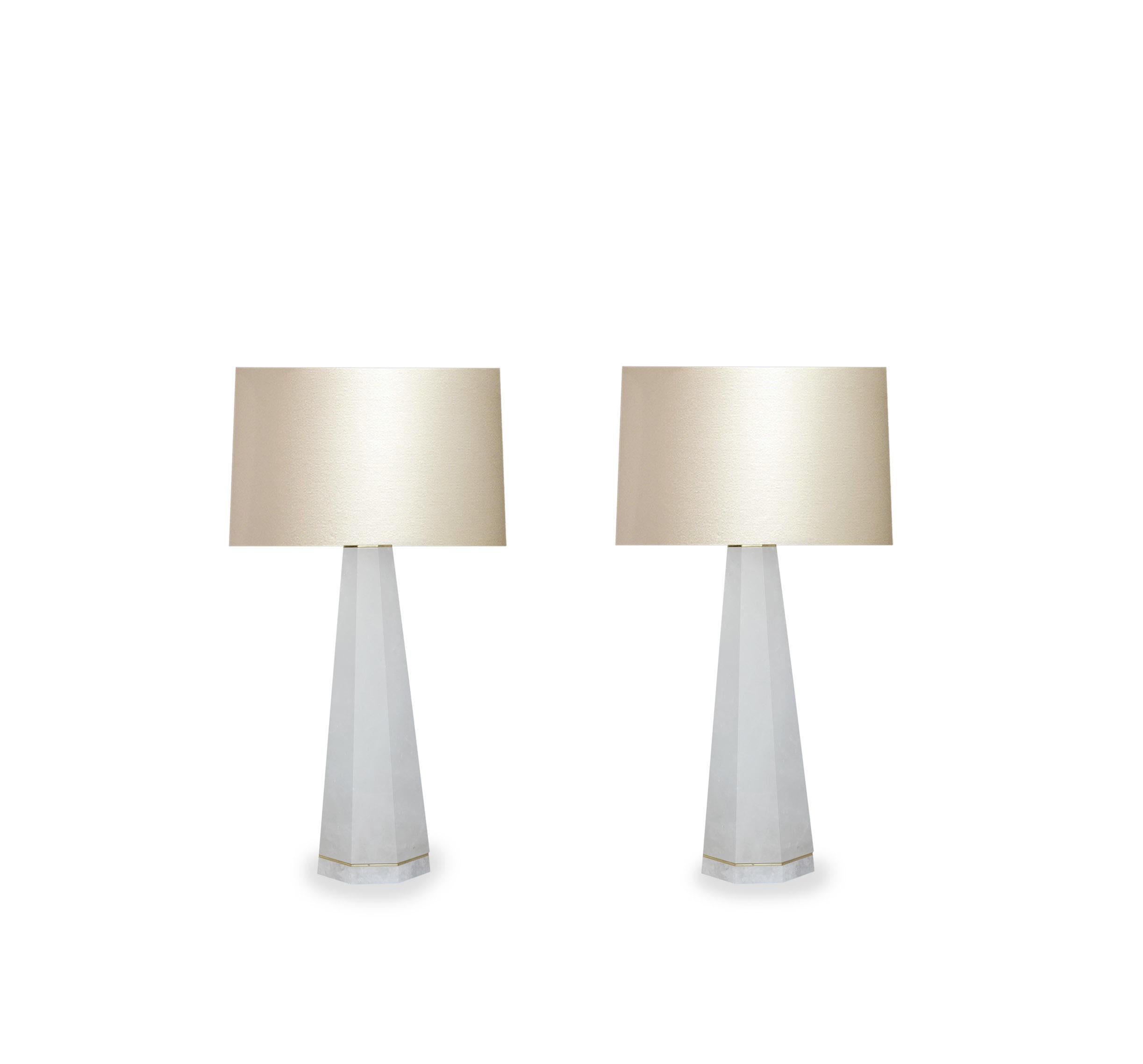 Pair of column rock crystal quartz lamps with polished brass decoration. Created by Phoenix Gallery, NYC.
Measure: To the top of rock crystal 19.5