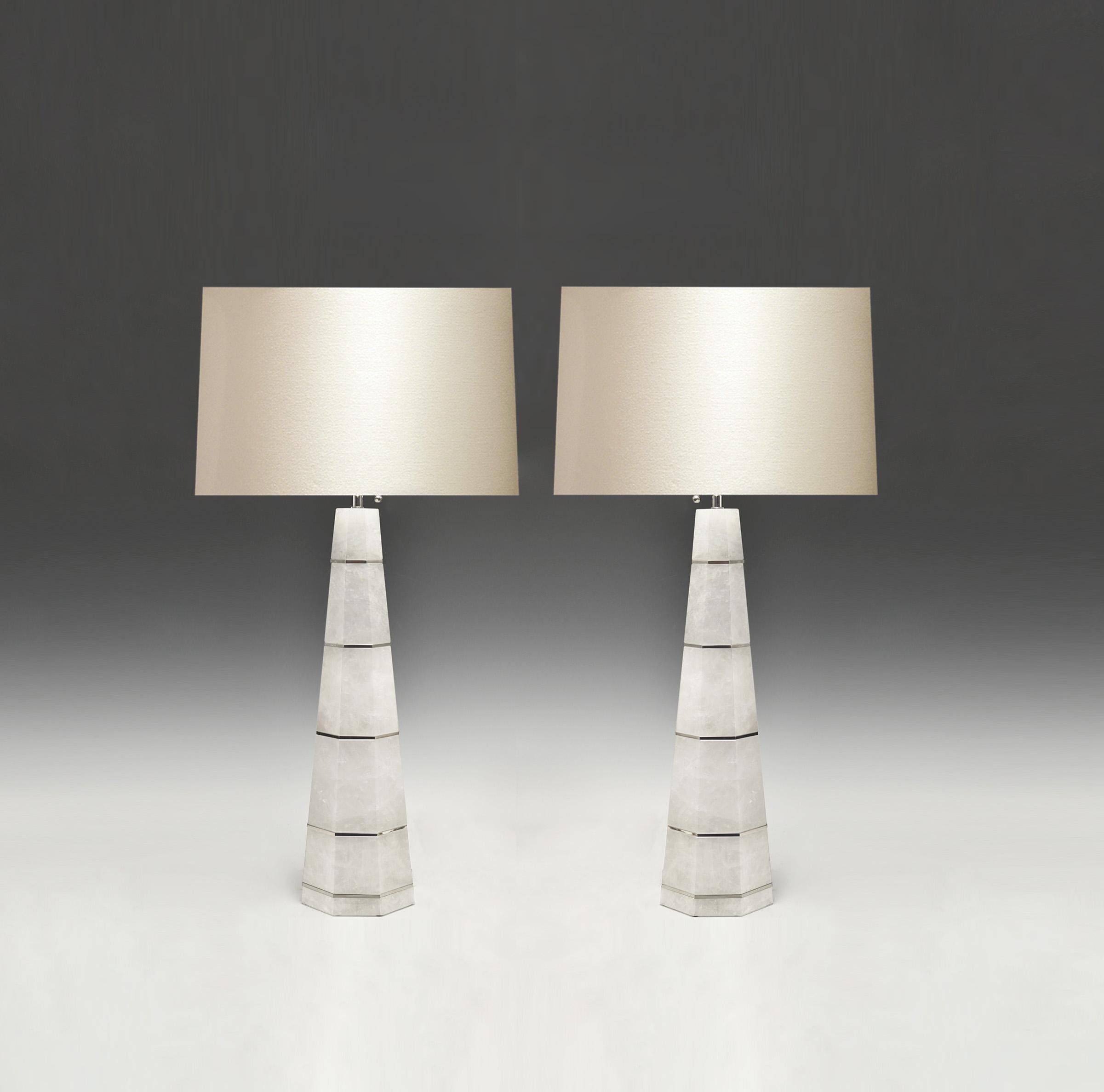 Pair of column rock crystal quartz lamps with nickel plating decoration. Created by Phoenix Gallery, NYC.
Measure: To the top of rock crystal: 21.5