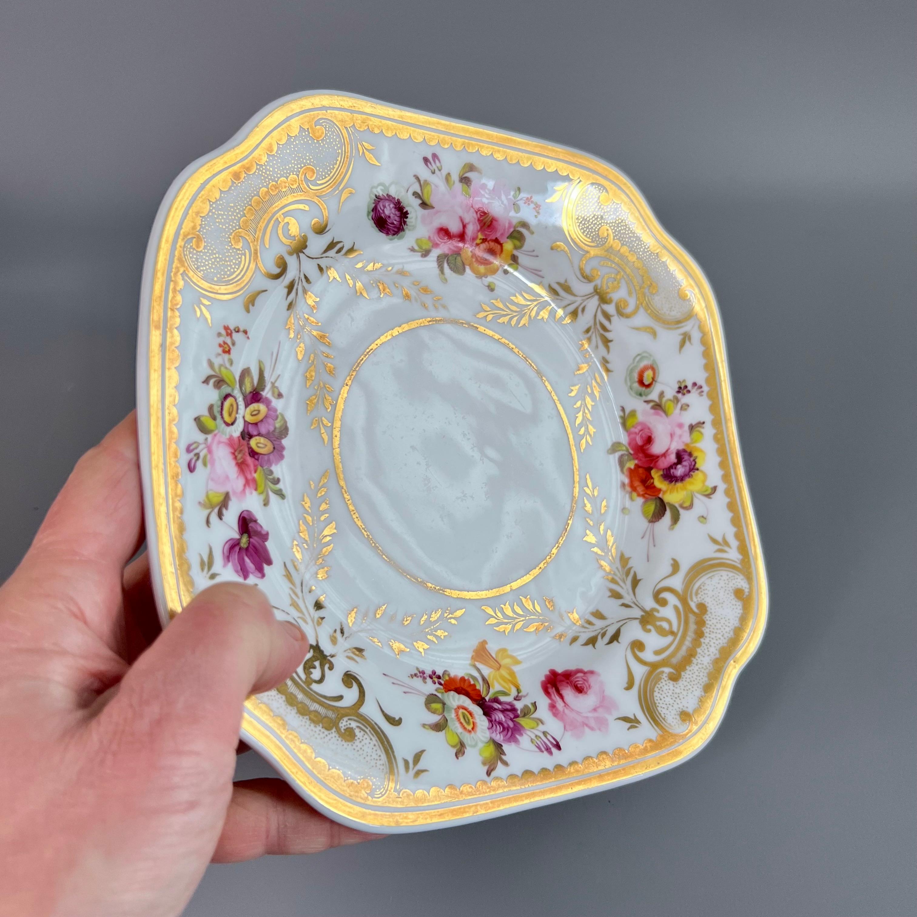 This is a rare and beautiful cake plate made by H&R Daniel in about 1825. The plate is potted in the square 