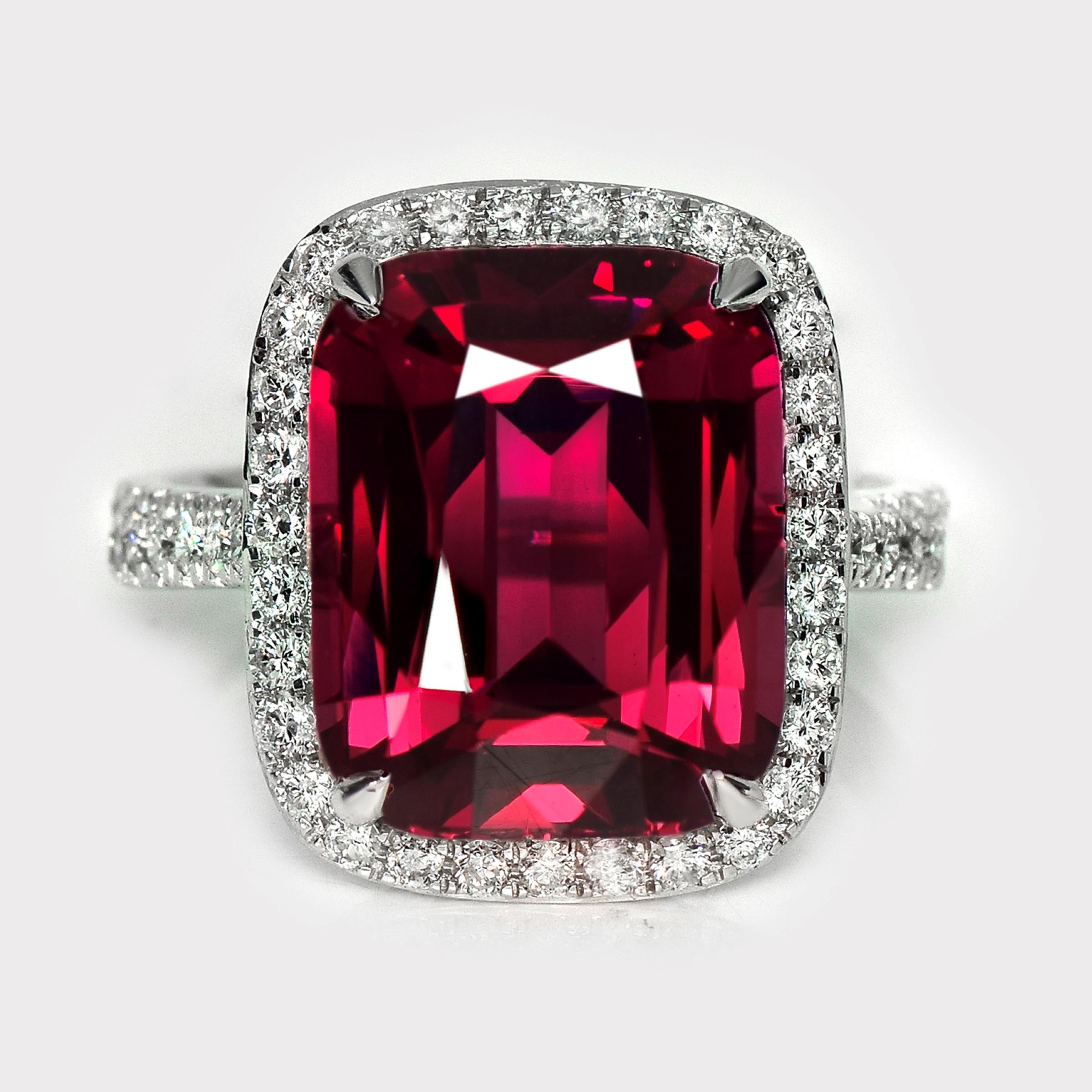 *HRD 10.00 ct 14K White Gold Vivid Purplish Red Mahenge Garnet Engagement Ring*

HRD-certified natural unheated vivid purplish red Mahenge Garnet as the center stone weighing 10.00 ct set on the 14K white gold halo design pave' band with natural FG