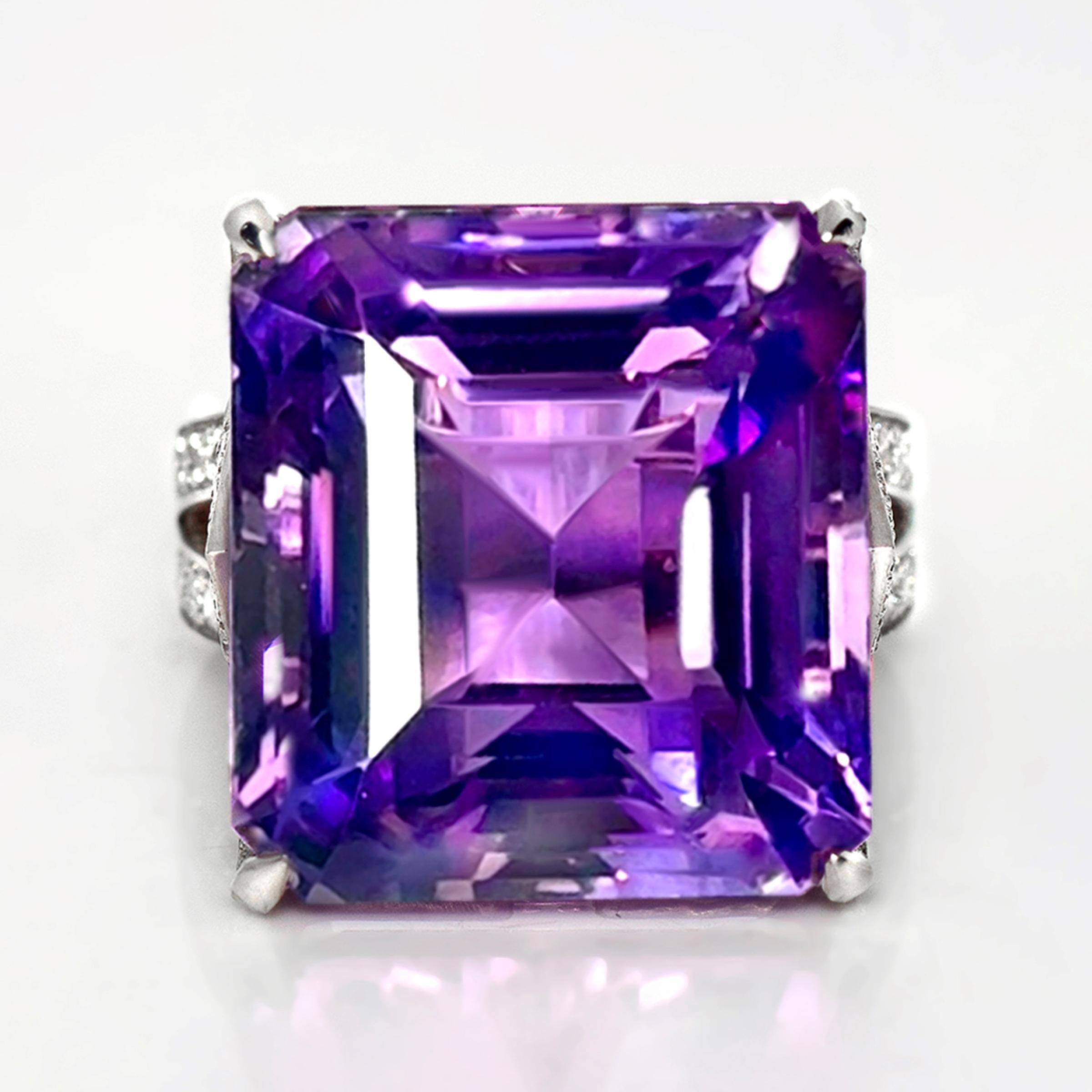 *HRD 14K 24.68 ct  Natural Vivid Purple Amethyst Diamonds Antique Engagement Ring*

This ring features a 24.68 carat natural vivid purple Amethyst set on the 14K white gold band and accented with FG VS diamonds weighing 1.23 carats.

This modern and