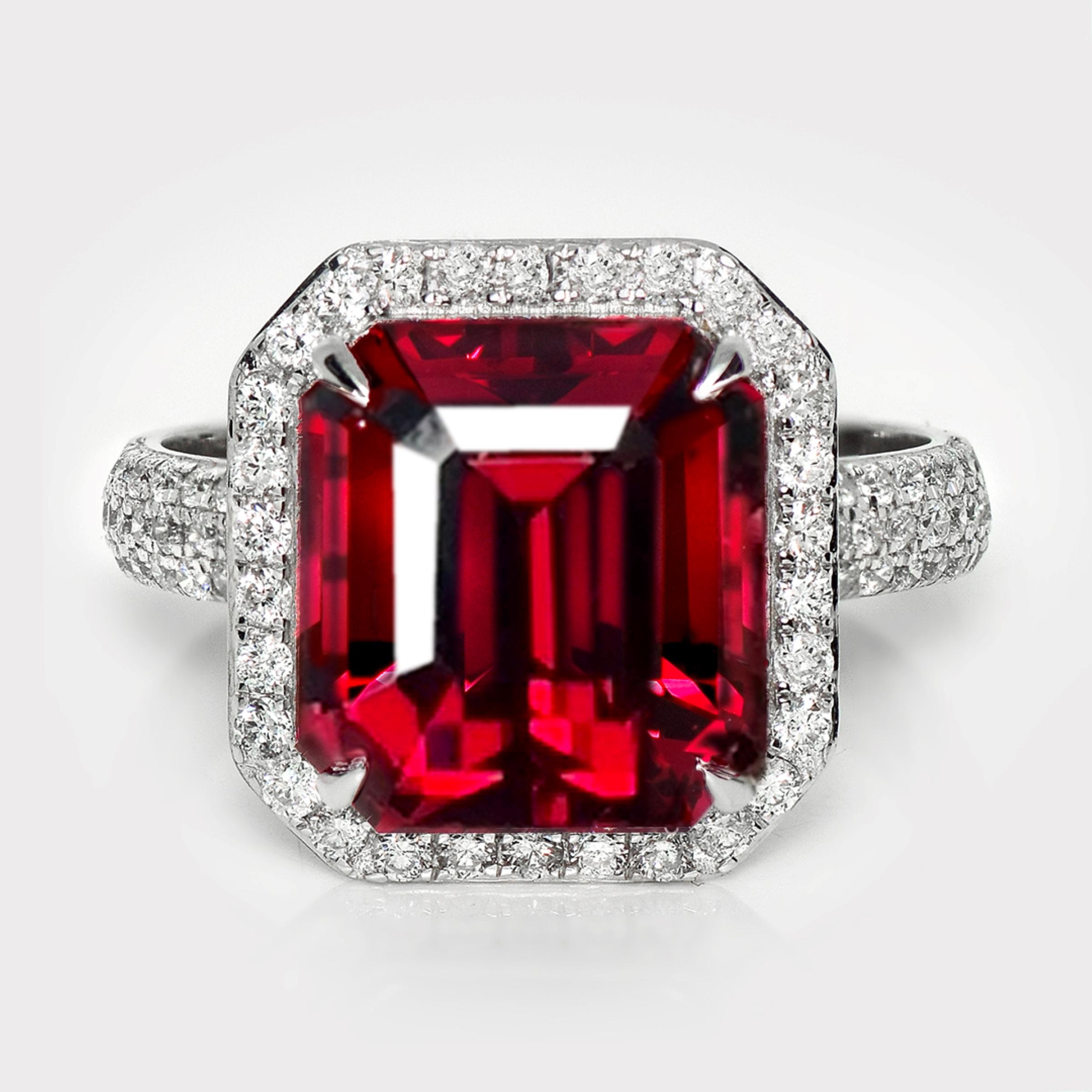 *HRD 8.15 ct 14K White Gold Vivid Red Garnet Engagement Ring*

HRD-certified natural unheated vivid red Garnet as the center stone weighing 8.15 ct set on the 14K white gold halo design pave' band with natural FG VS diamonds weighing 0.59 ct.  

The