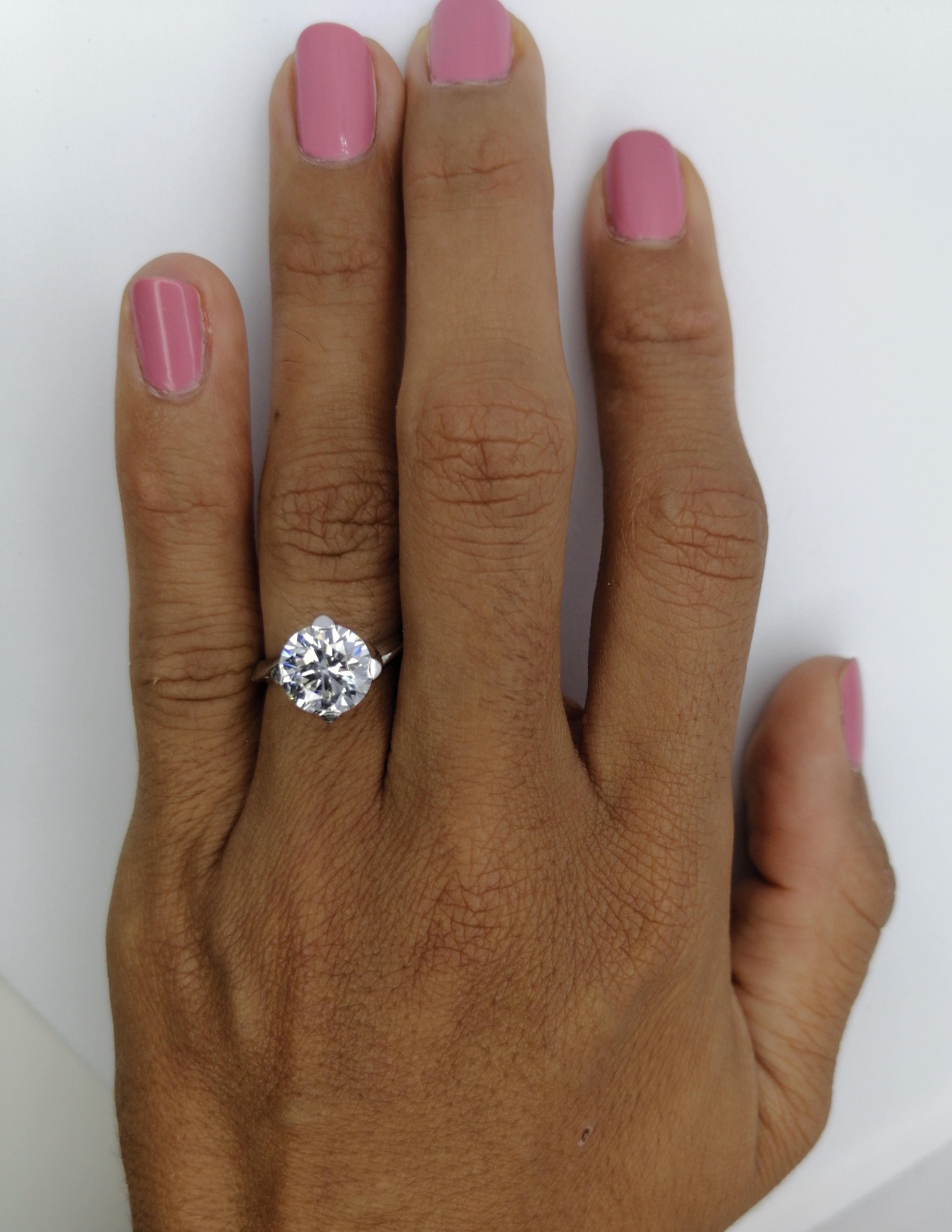 One of a kind 2.30 carats diamond ring. This is a very special stone because is an exceptional white G color in fact in the certificate is clearly written a rare white G so it looks much whiter. And the most amazing detail is the clarity is a si2