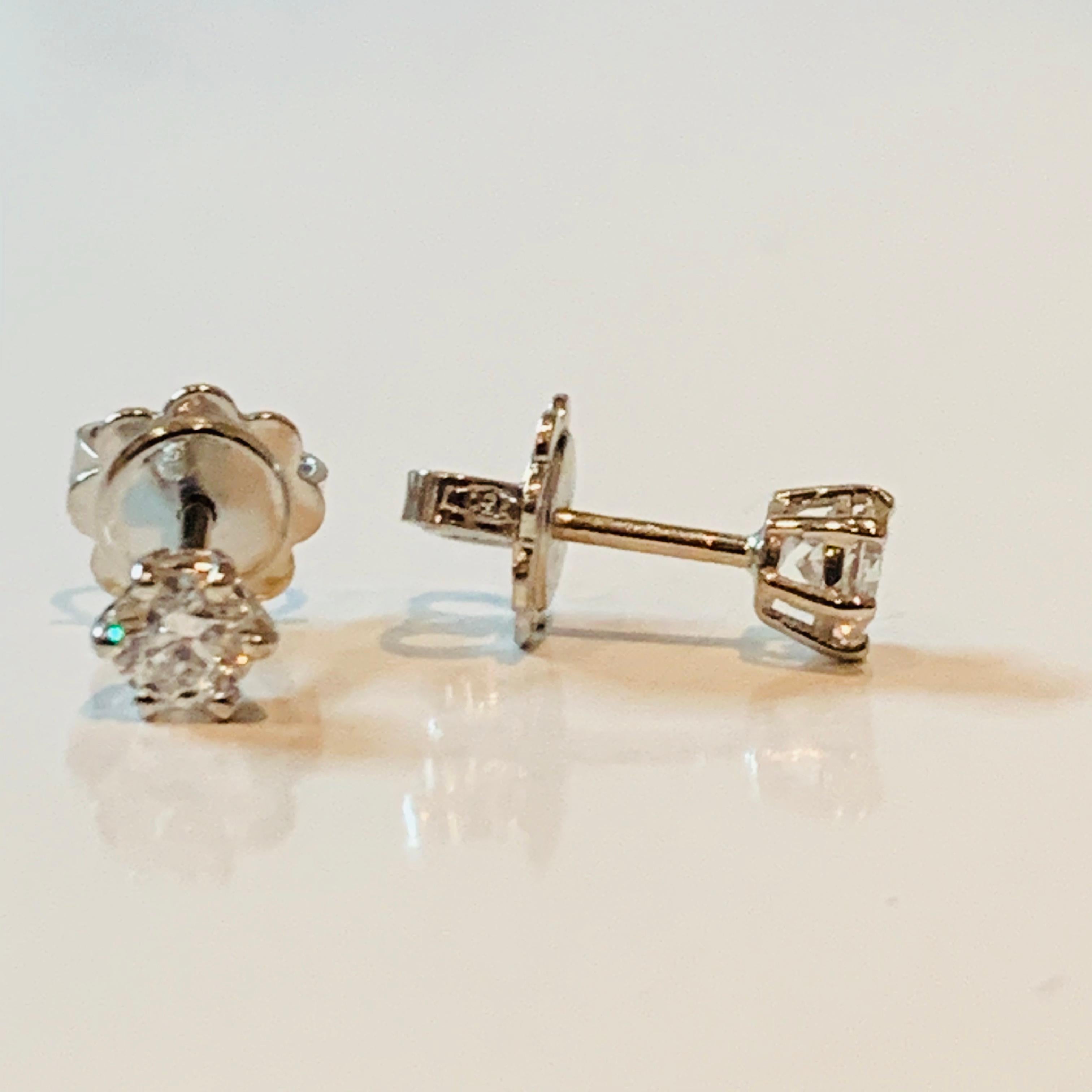 Round Cut HRD Certified 0.27 Carat Star Diamonds Set in 18Kt White Gold Stud Earrings