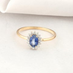 HRD Certified 0.65 Carat Blue Sapphire 0.11 Carat Diamond Cocktail 18k Gold Ring