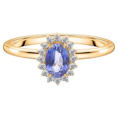 HRD Certified 0.65 Carat Blue Sapphire 0.11 Carat Diamond Cocktail 18k Gold Ring