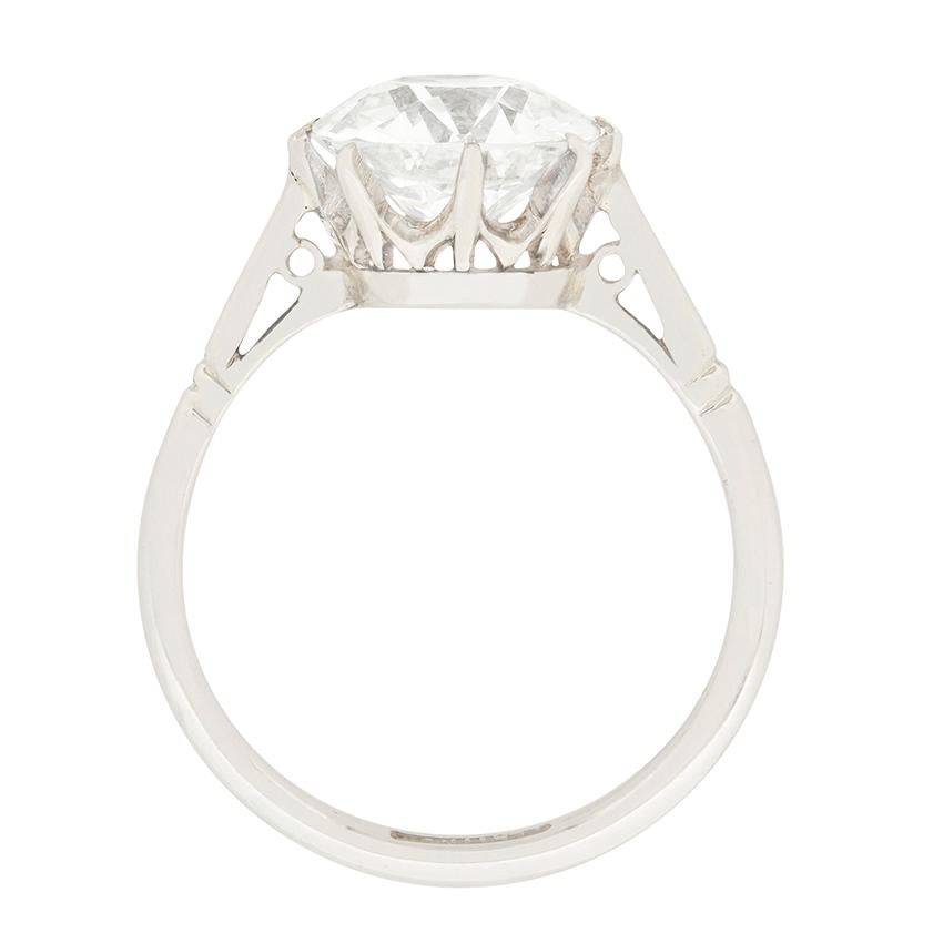 This simply stunning diamond solitaire ring steals the show with a 3.03 carat centre diamond. It is an old cut diamond, dating back to the 1920s. The stone has been certified by HRD and given a colour grade of I and clarity of VS1, and then reset