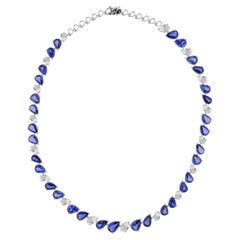 HRD-zertifizierte Halskette aus 18-karätigem Weißgold mit einem blauen Saphir (42,2 Karat) und einem Diamanten (8,1 Karat)