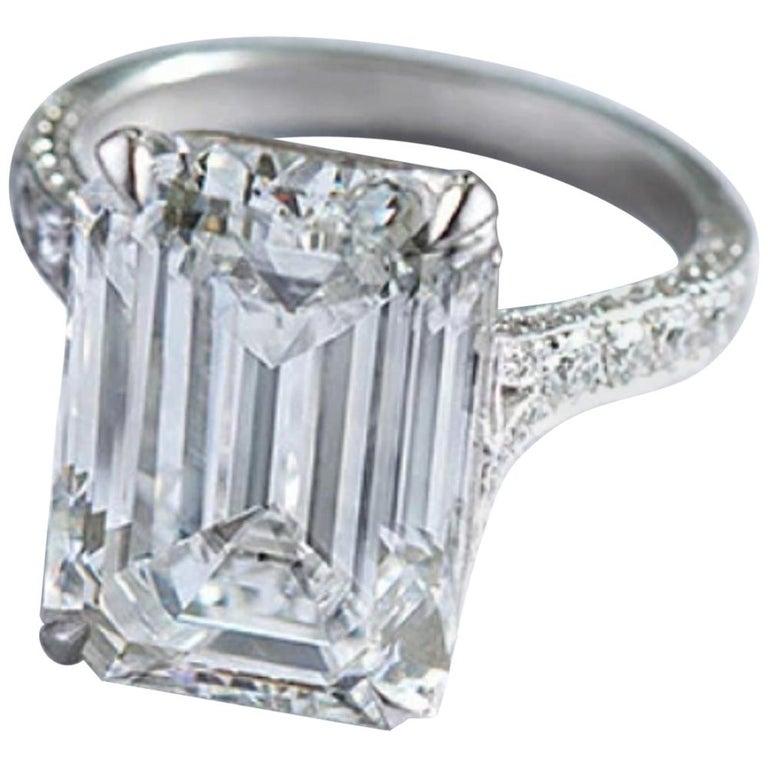 An amazing and white faced emerald cut diamond with a very pure clarity being internally flawless by GIA

The side diamonds in the pave are all round brilliant cut Diamonds and the ring Is mounted in solid Platinum.
