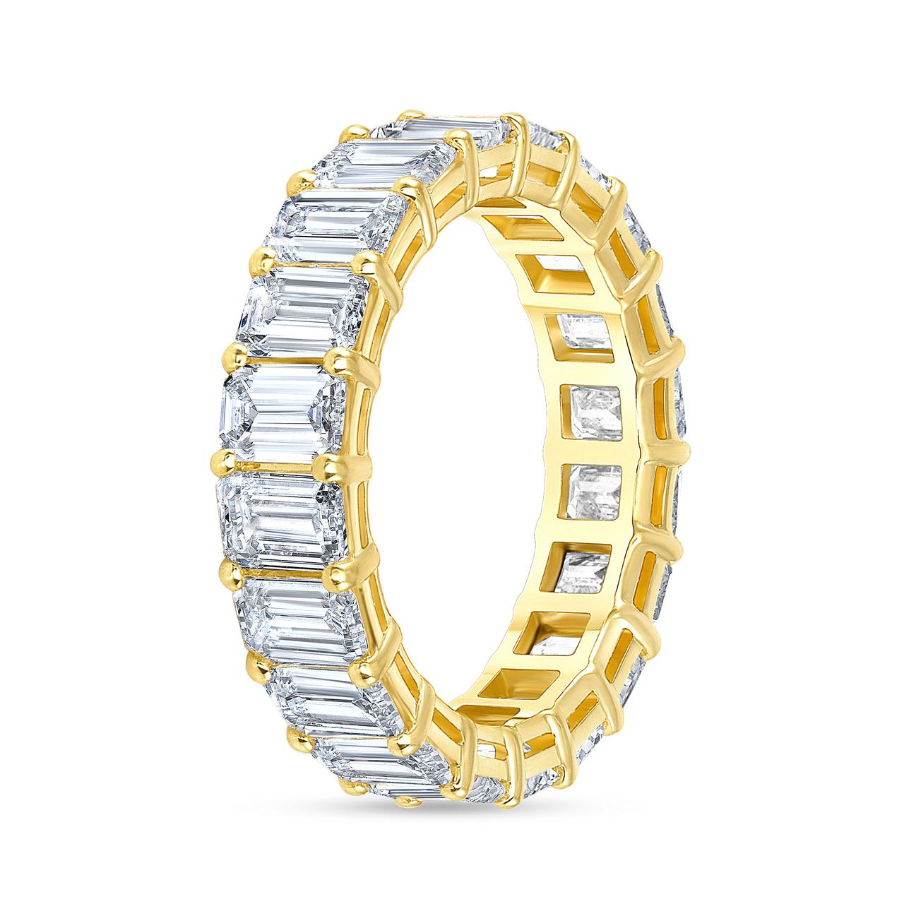 A fine and impressive 5.65 carat Eternity Diamond Ring.
The Diamond Band Ring is set with 22 Emerald Cut Diamond weighing approximately 0.25 Carat each.
The diamond color is F/G, and the quality is VS.
The band rings is made to order, which means