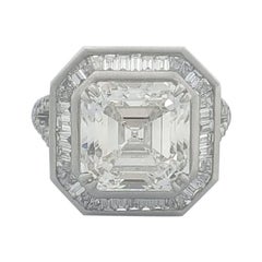 HRD Certified 6.90 Carat White Asscher Cut and Baguette Diamond Ring In 18 K. 