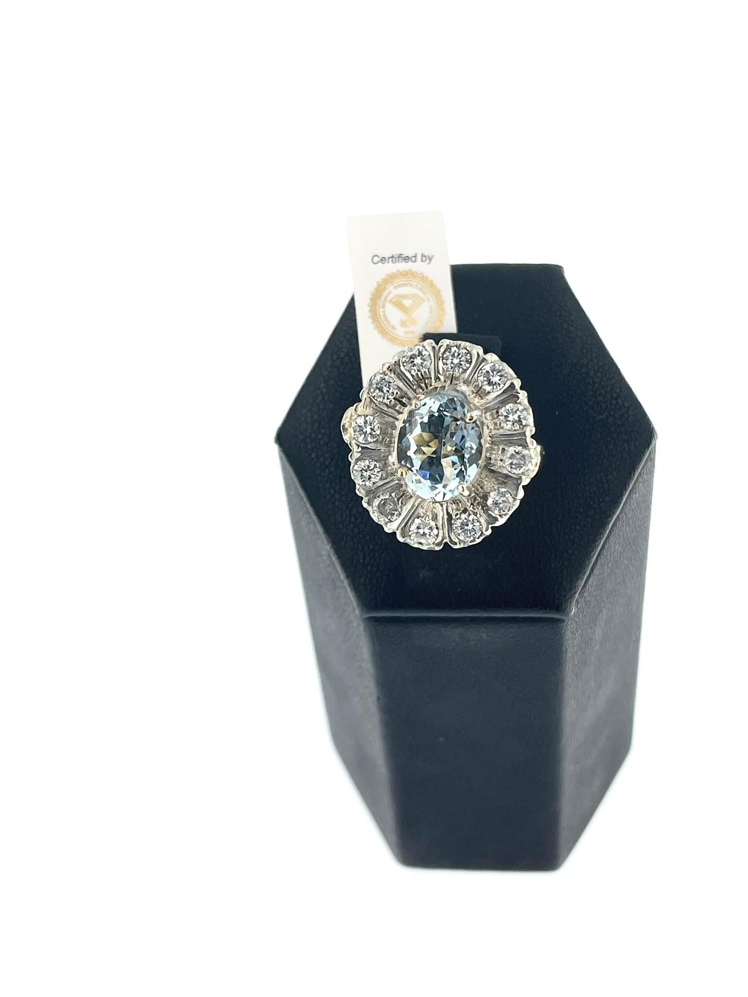 This antique aquamarine and diamonds ring is a true testament to timeless elegance and craftsmanship. With a blend of yellow gold and silver, it offers a unique and striking contrast that adds to its charm.

At the center of the ring sits a