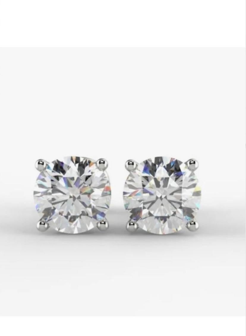 Amazing HRD certified diamonds of 2.00 carats on earrings in 18k gold.
Diamonds are 1 + 1 carats, J/ VS1-VS2 , triple XXX, round brilliant cut.
Complete with HRD certificate.
Handcrafted by artisan goldsmith.
Excellent manufacture and