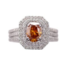 HRD-zertifizierter intensiv gelber und orangefarbener Fancy-Diamant-Verlobungsring