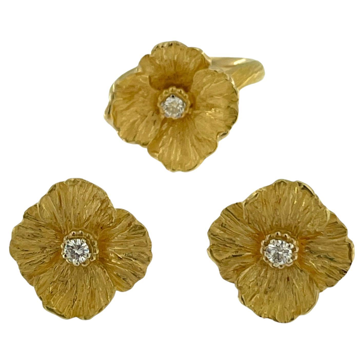 HRD-zertifizierter Gelbgoldring und Ohrringe mit Blumenfassung und Diamanten