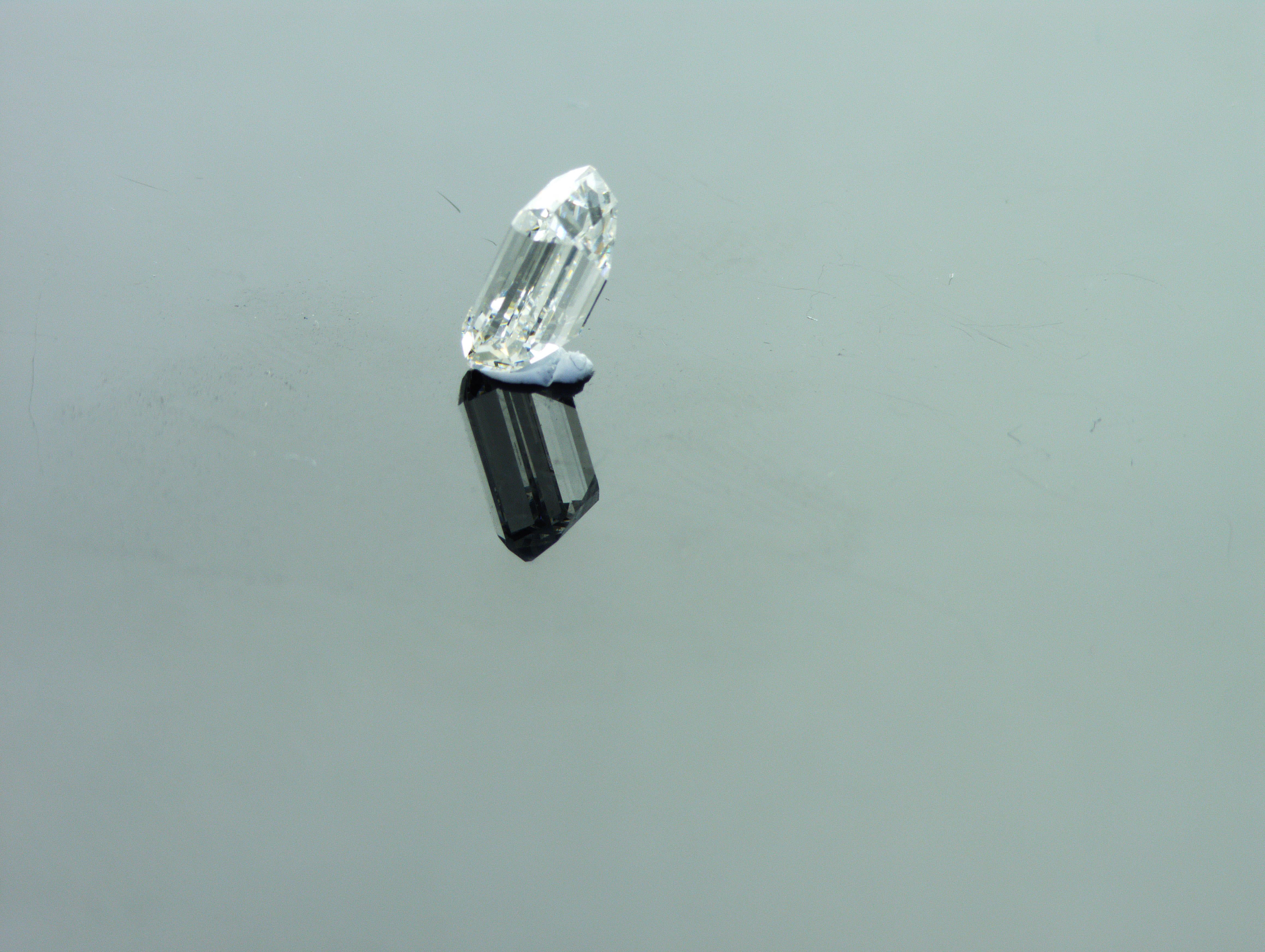 Emerald Cut HRDAntwerp certified 0.93 carat Emerald Shape Natural Diamond E Loop Clean (IF) For Sale