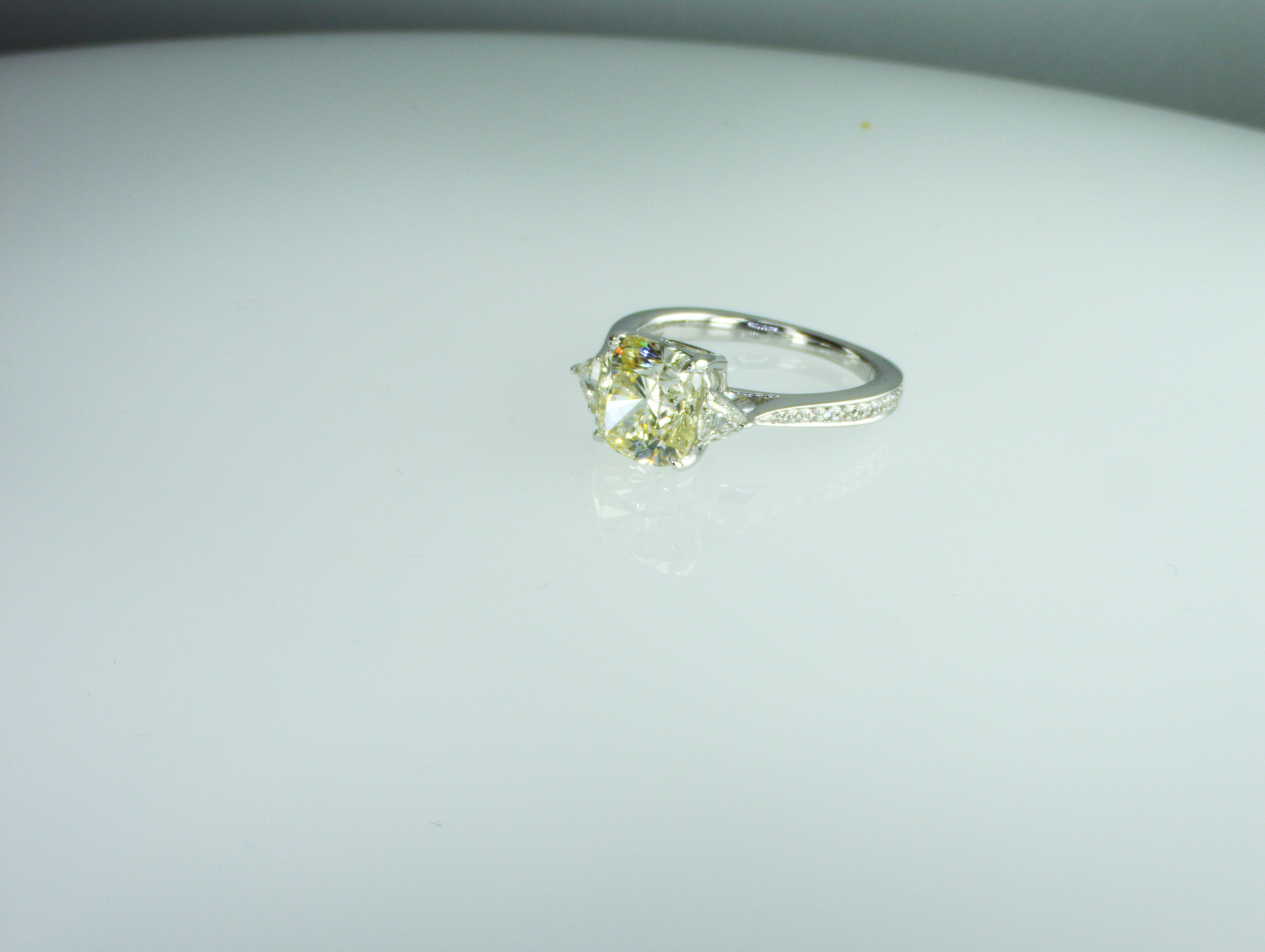 We are natural diamond production company located in Dubai. 
Absolutely gorgeously looking 3 carat Natural Diamond earring.
Description:
Diamond 3 carat:
Shape-Cushion
Colour grade - TW (L) -TC
Clarity -SI
2 diamonds 0.29 carat:
Shape-