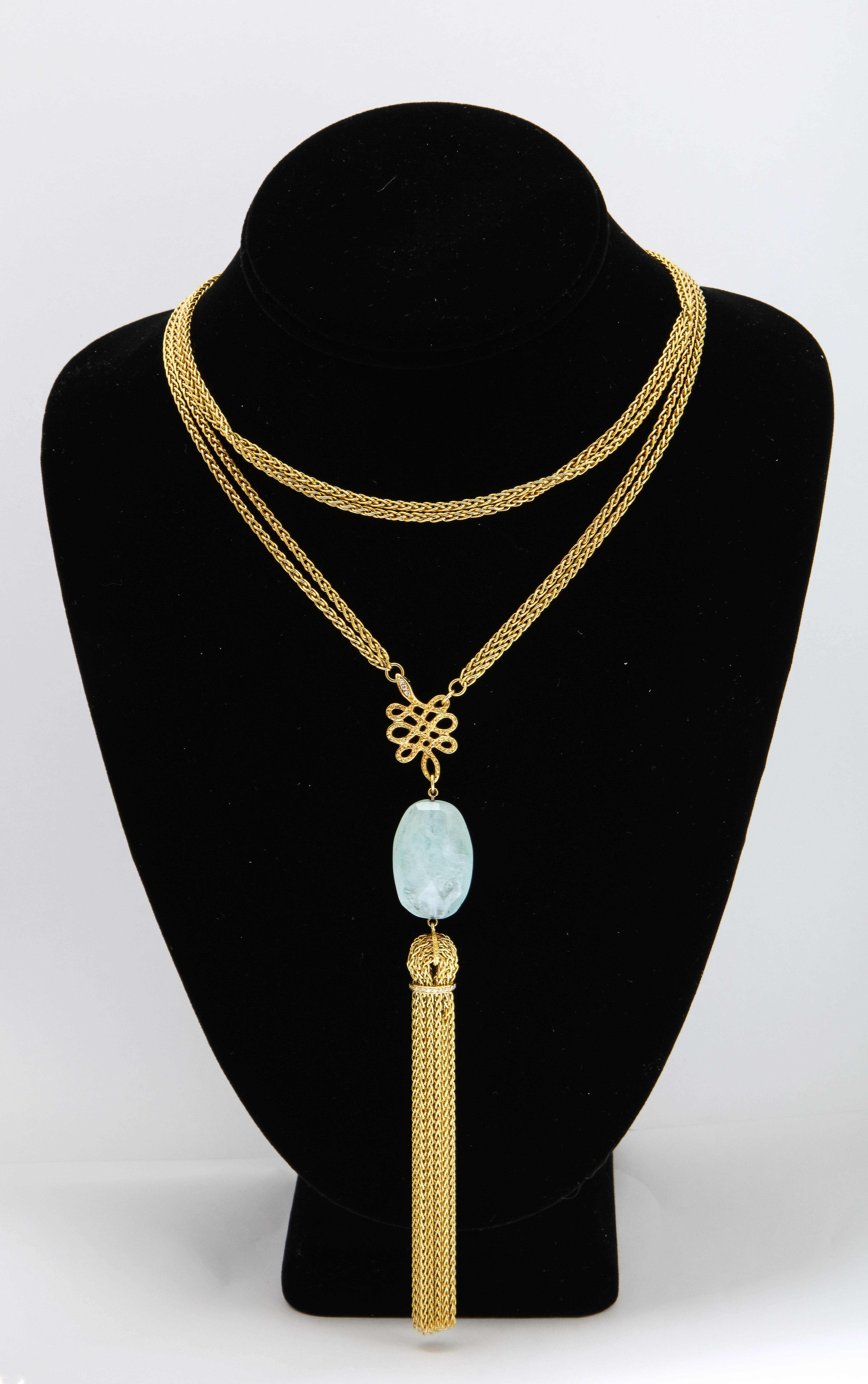 18kt Yellow Gold Long Tassel -Fringe Style Chain Necklace Designed With A 29 MM Rough Cut Aquamarine And Also Embellished With Full Cut Diamonds Throughout.Created By H.Stern In The 1980's.Finished With An Easy Watch Chain Type Clasp For Easy