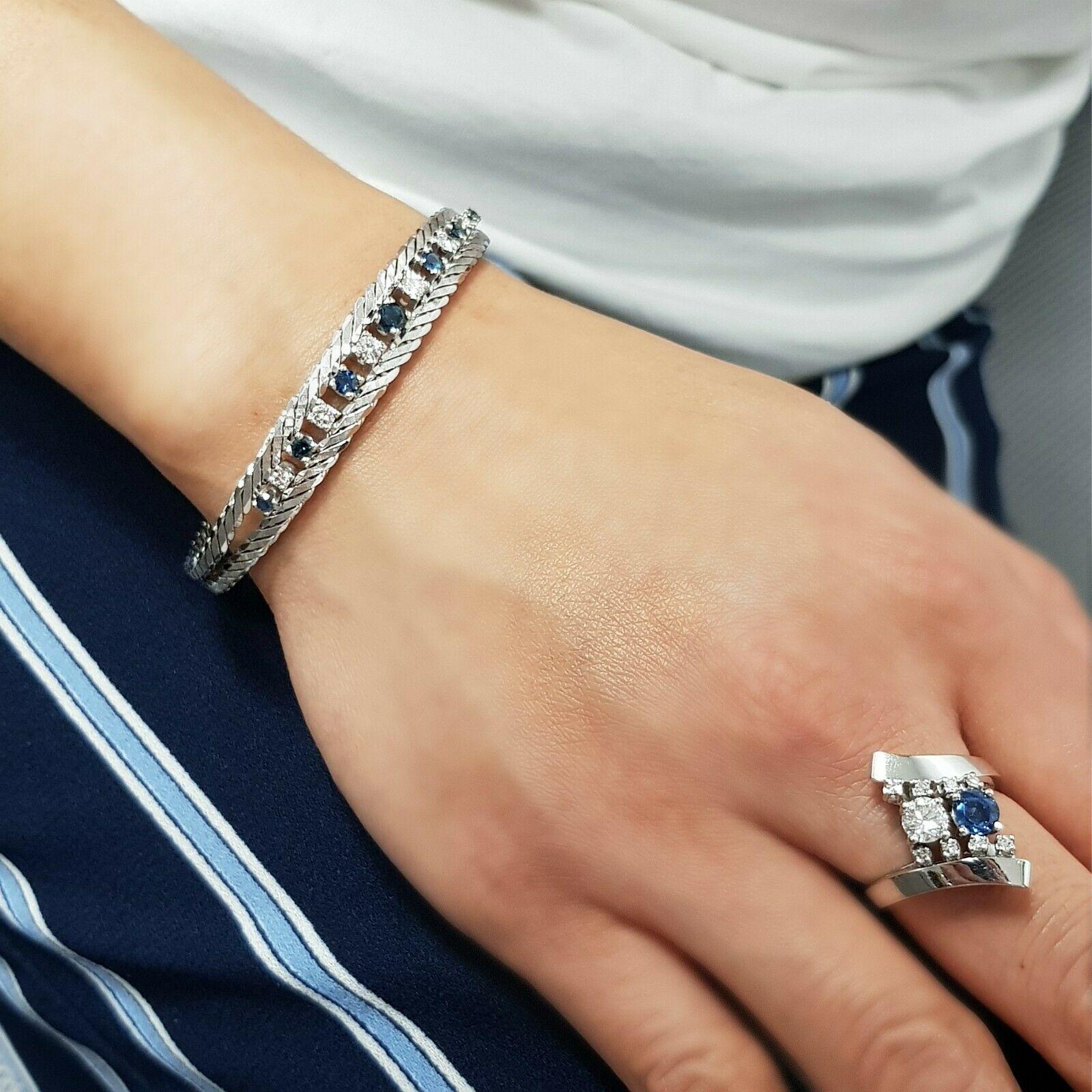  This is classic ring by H.STERN company, features 1 piece blue sapphire and 9 pieces round cut diamonds. This ring crafted in 18k white gold metal. We also have the set of necklace and rings, that can be sold separately.
Specifications:
    main