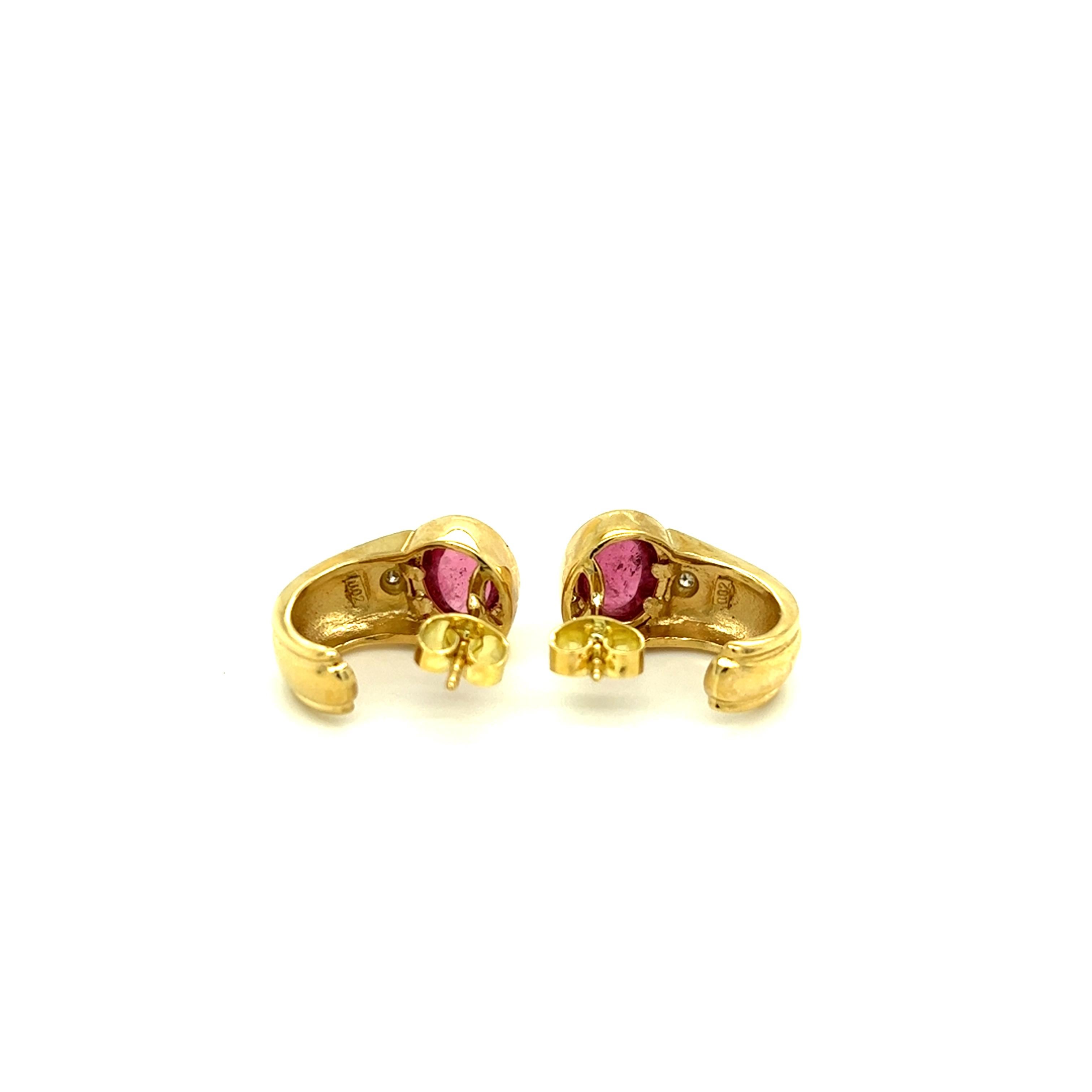 One pair of 18 karat yellow gold earrings, designed by H. Stern, (stamped 002 750) each set with one 8.5x6mm oval cabochon pink tourmaline and one round brilliant cut diamond, approximately 0.06-carat total weight with matching G/H color and VS