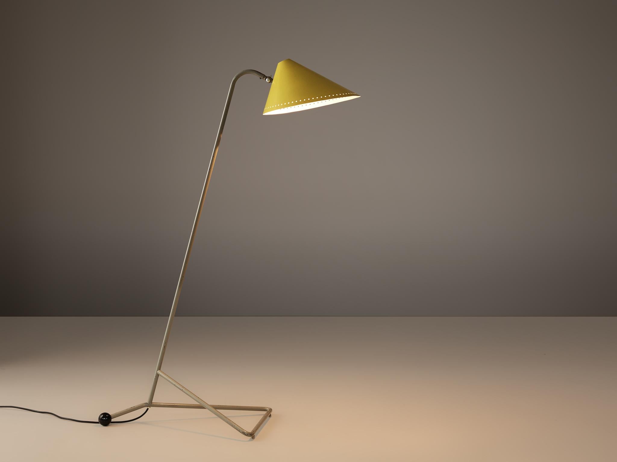 H.Th.A.Busquet for Hala Zeist, floor lamp, metal, the Netherlands, 1960s

With its yellow shade this Dutch lamp catches the eye. The conical shade is held by a slim metal base with a highlighted black ball end. The lamp has a playful character with