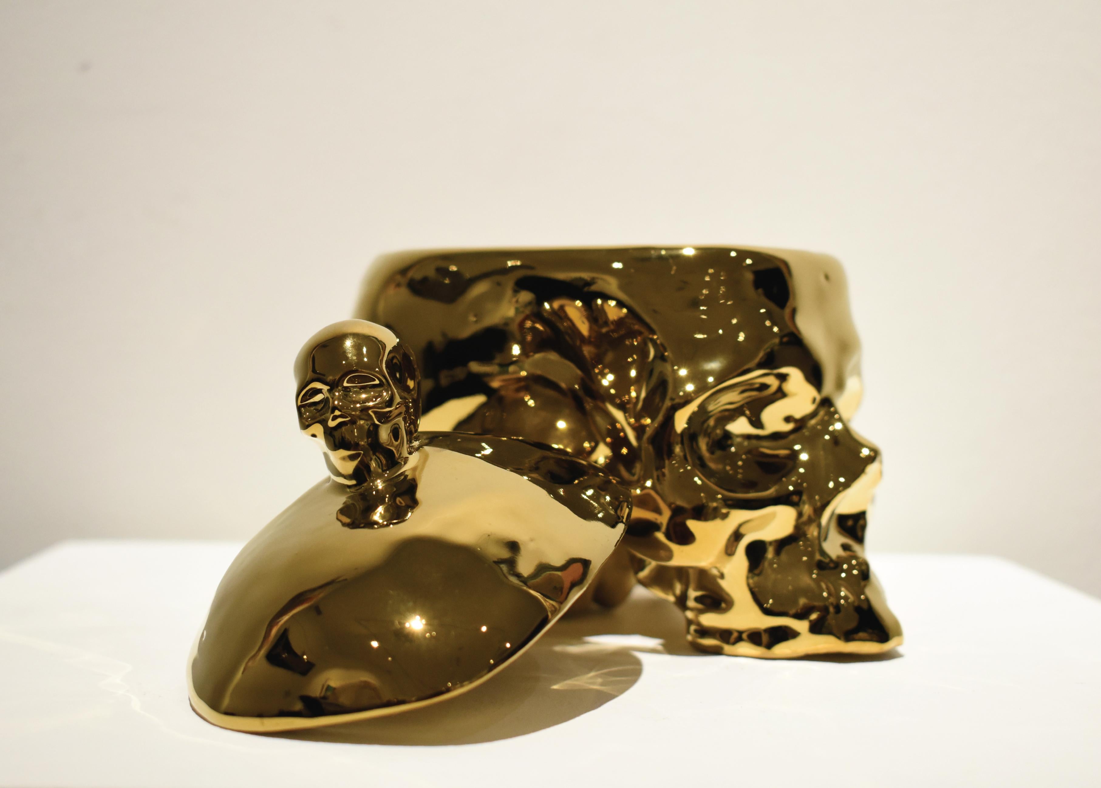 Porcelain Sculpture With Skull Shape In Gold Color, Removable Cover - Brown Figurative Sculpture by Huang Yulong