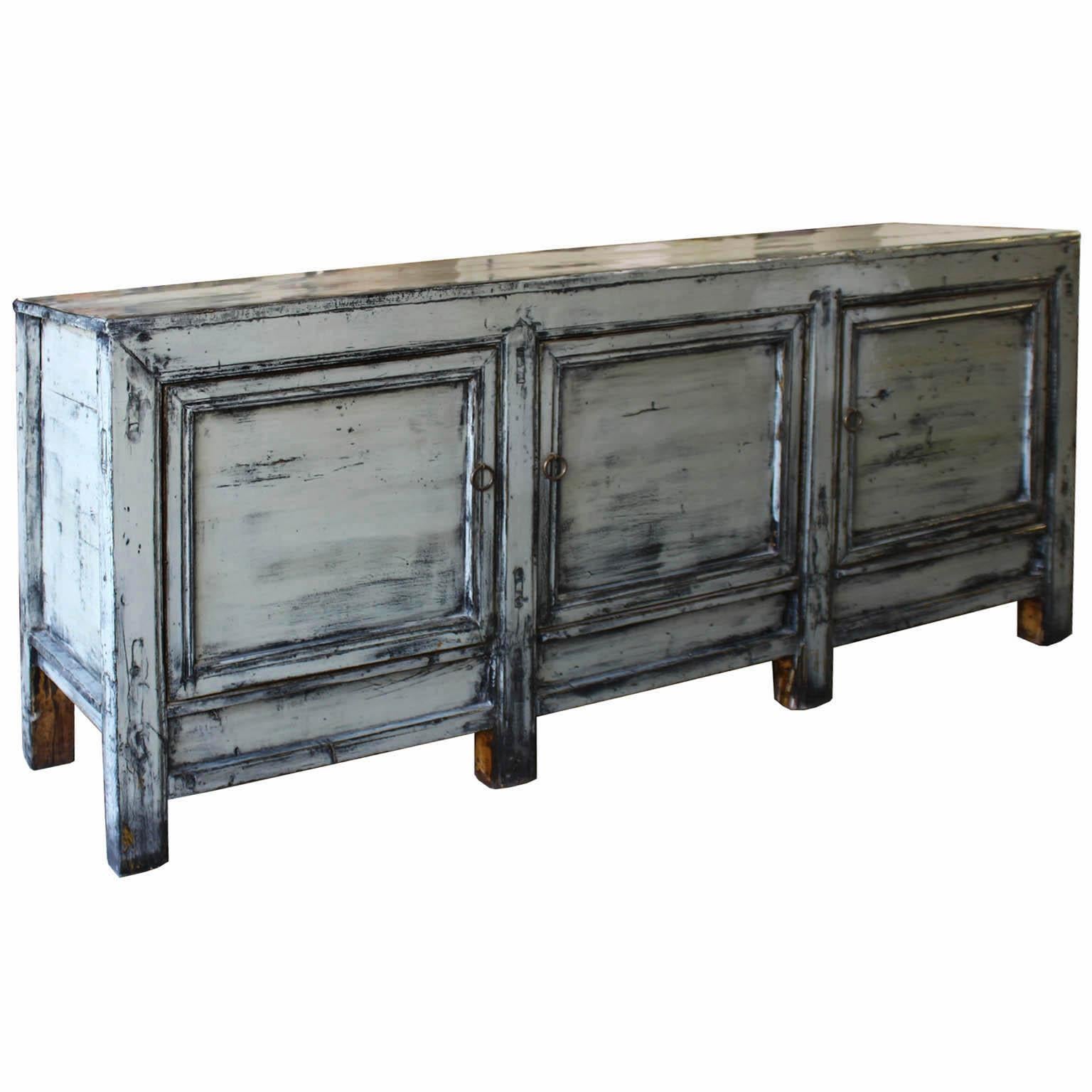Hand-painted gray lacquer sideboard from Hubei province has modern clean lines with three doors with ample storage. Beautiful beneath artwork or a flat screen TV. New interior shelves and hardware.