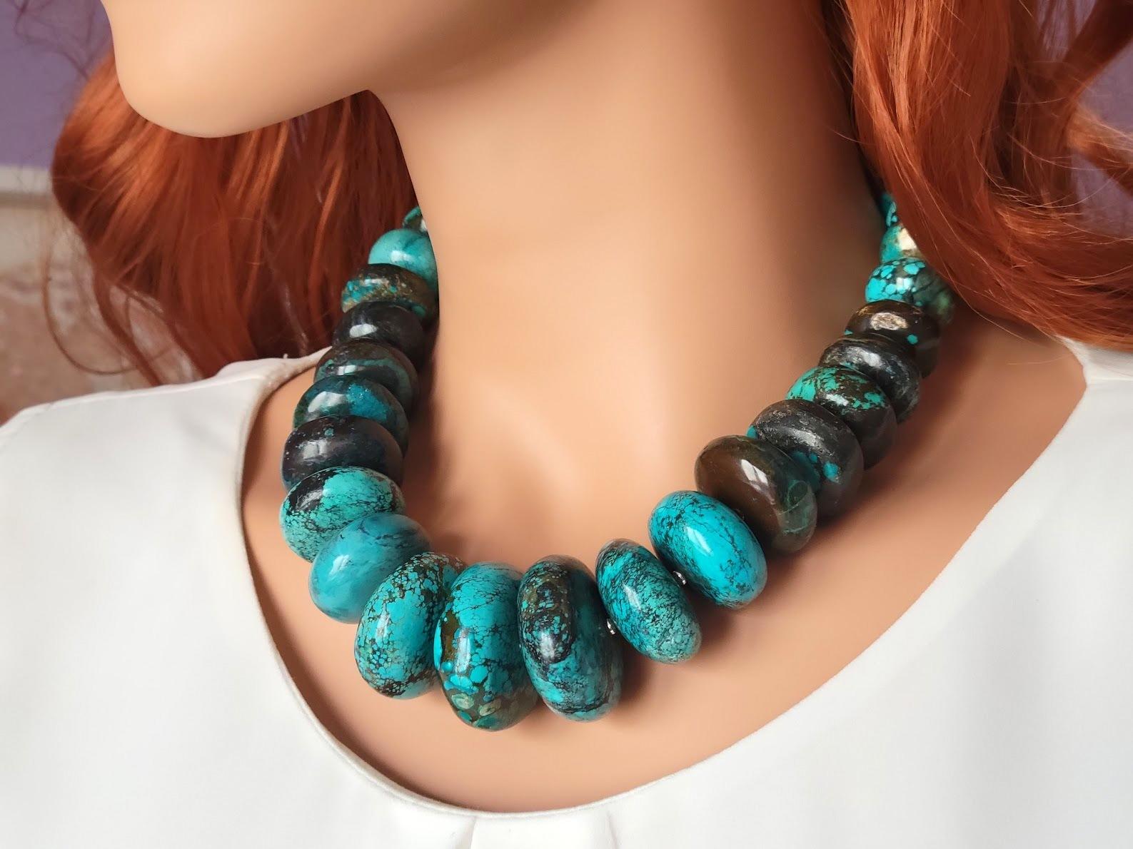 The length of the necklace is 19 inches (48 cm).
The size of the rondelle beads varies from 16 mm to 33.5 mm.
Turquoise ranges in color from a light shade of green to light blue to a beautiful dark blue. Turquoise beads have a dark brown or black