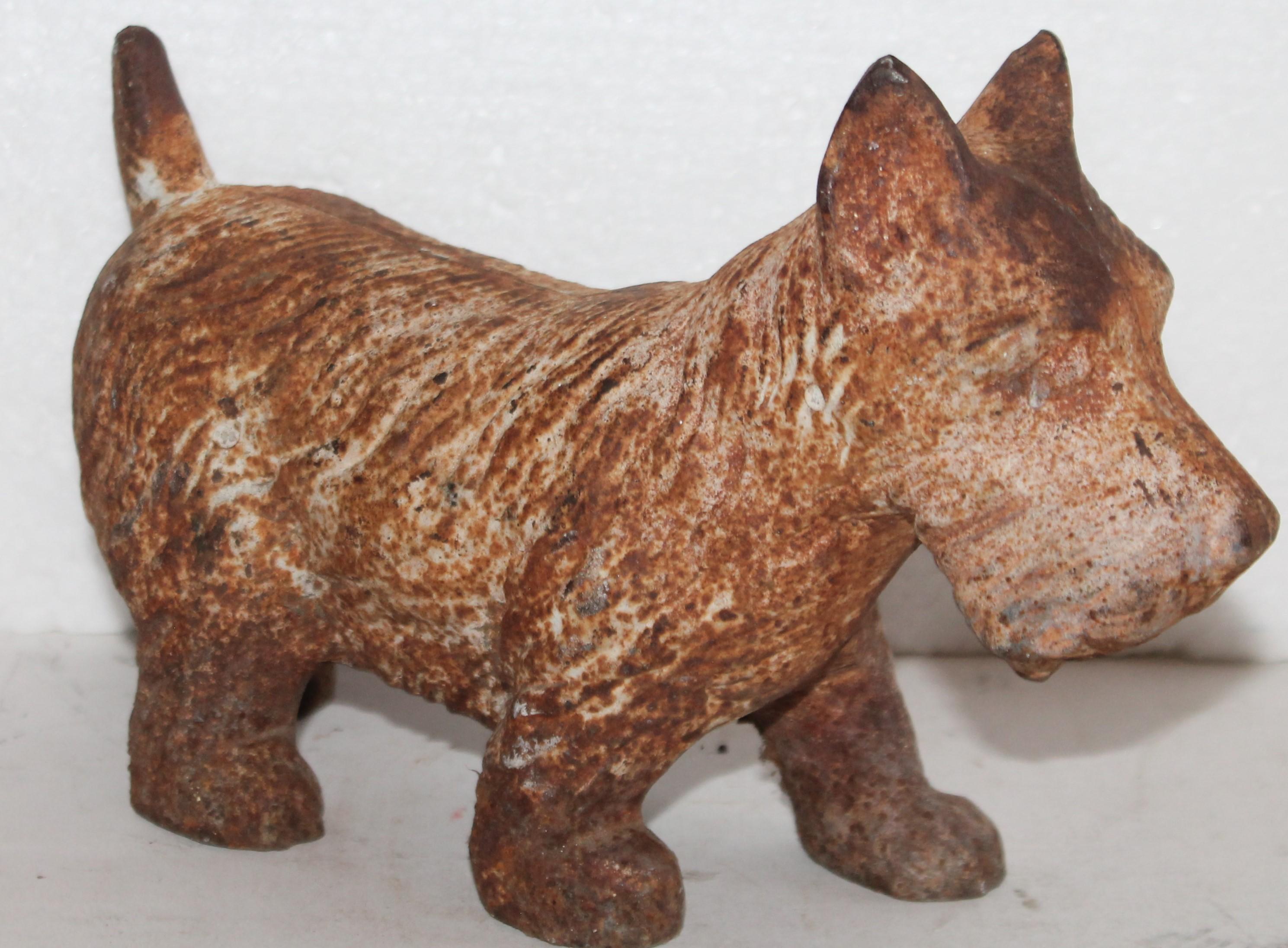 This original aged and worn heavy Hubley Scottie door stop. This is especially heavy weighted door stop. This is the best worn surface ever!