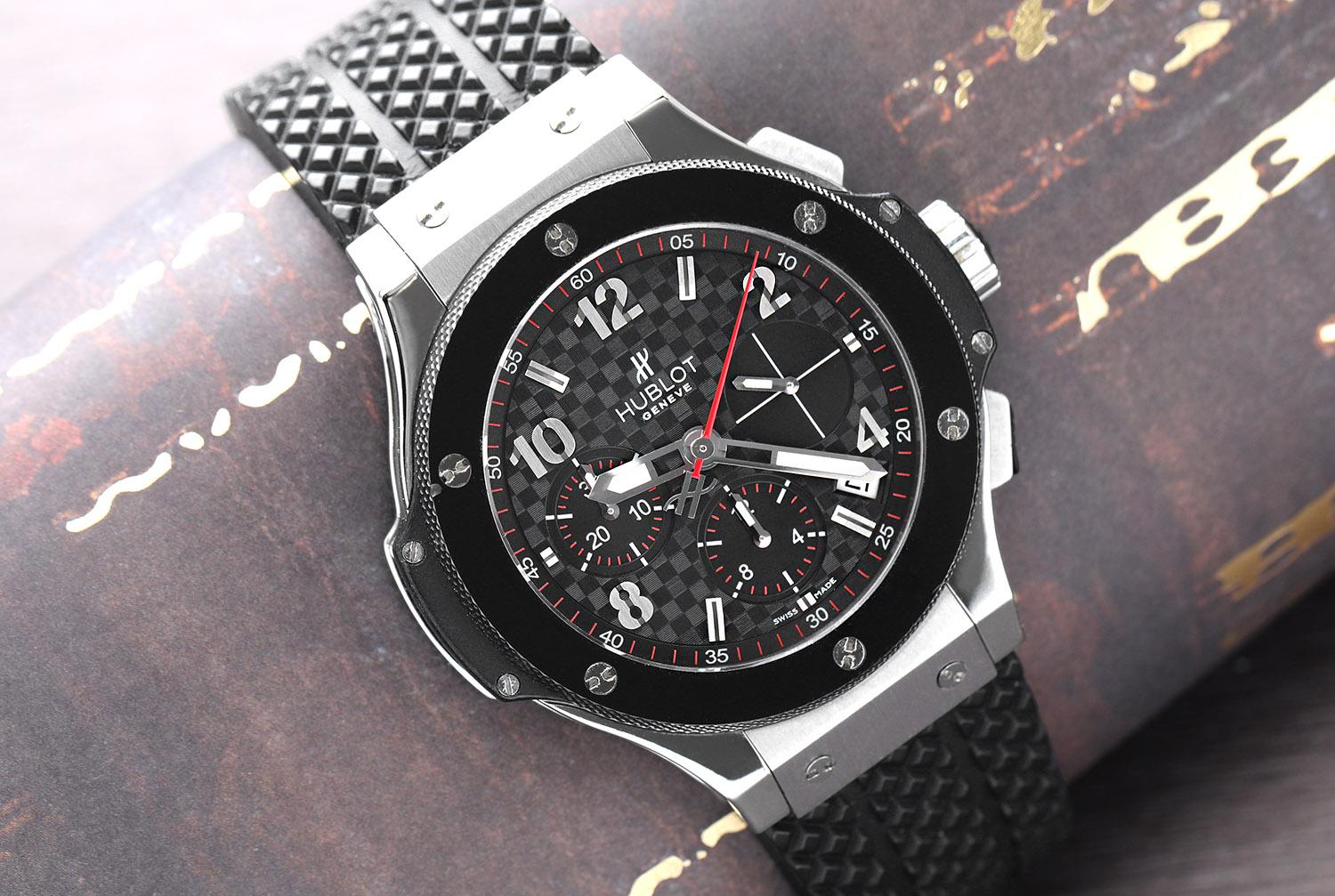 Watch comes with box, papers and appraisal certificate. It is covered by our in-house 1 year mechanical warranty. Stainless steel case with a black rubber strap. Fixed black ceramic bezel (has a little chip, see images). Black carbon fiber dial with