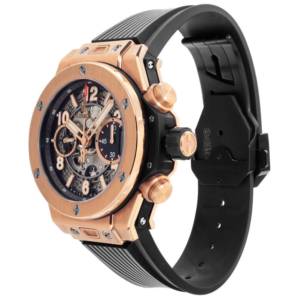 Hublot Big Bang Unico in a brushed 18k rose gold with skeletonized dial on rubber strap with PVD deplotant buckle. Automatic movement under glass w/ subseconds and date. 42 mm case size. With additional grey leather strap, box and papers. Ref
