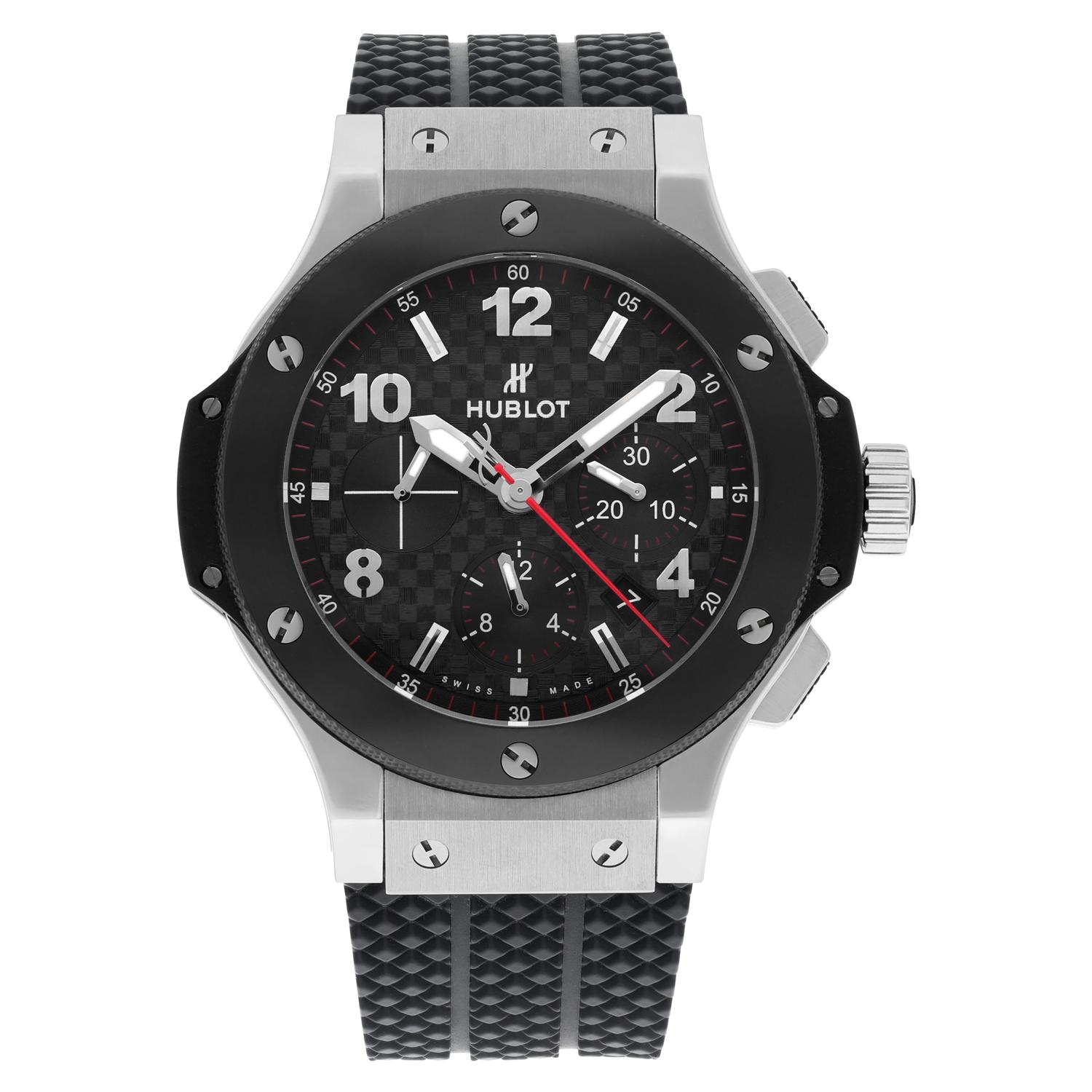 This Hublot Big Bang wristwatch is a stylish and functional accessory for any man. With a 44mm round stainless steel case and polished finish, the watch has a sleek and modern look. The black carbon fiber dial features both Arabic numerals and baton